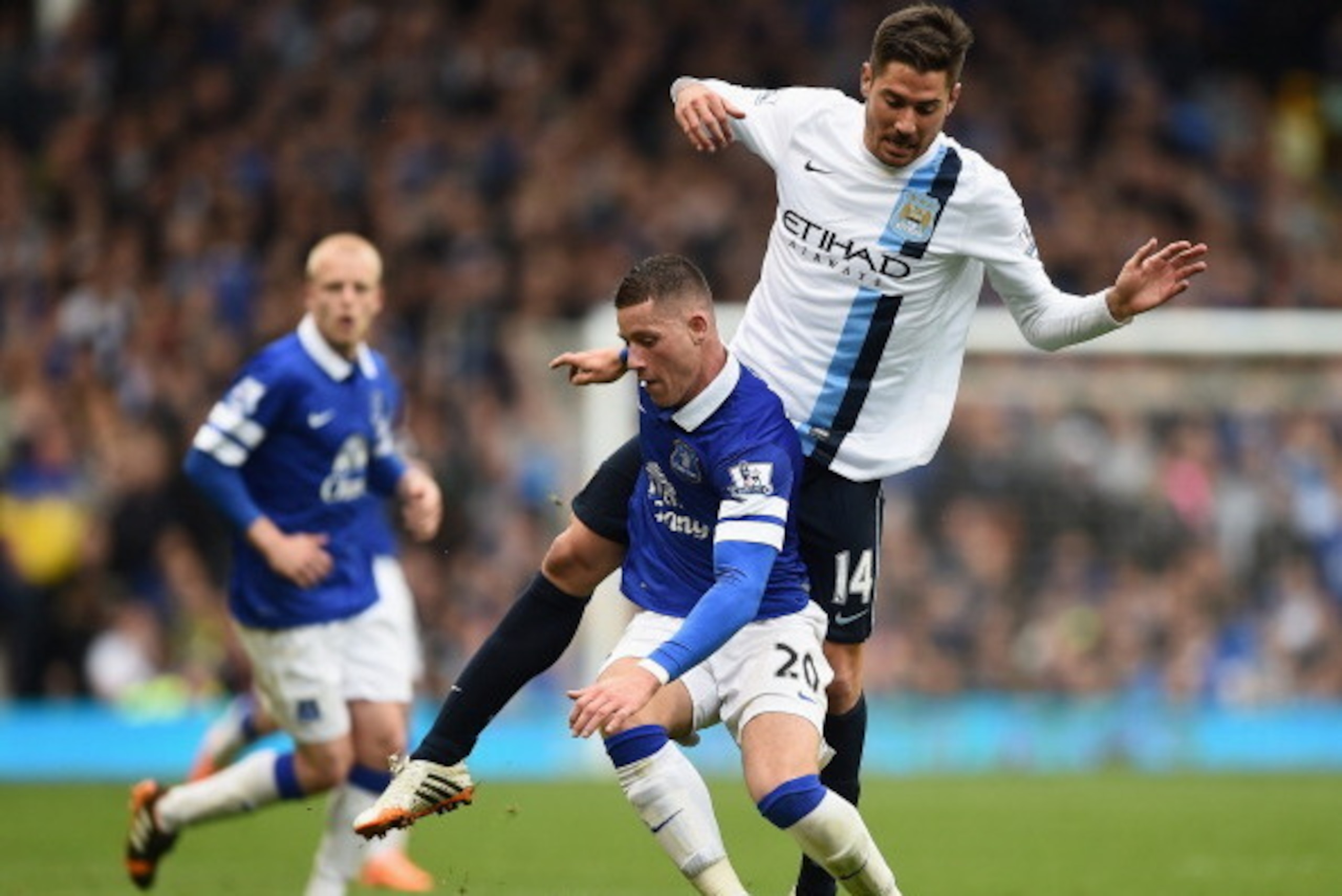 LIVERPOOL, ENGLAND - MAY 03:  Javi Garcia of Manchester City competes with Ross Barkley of Everton during the Barclays Premier League match between Everton and Manchester City at Goodison Park on May 3, 2014 in Liverpool, England.  (Photo by Laurence Grif
