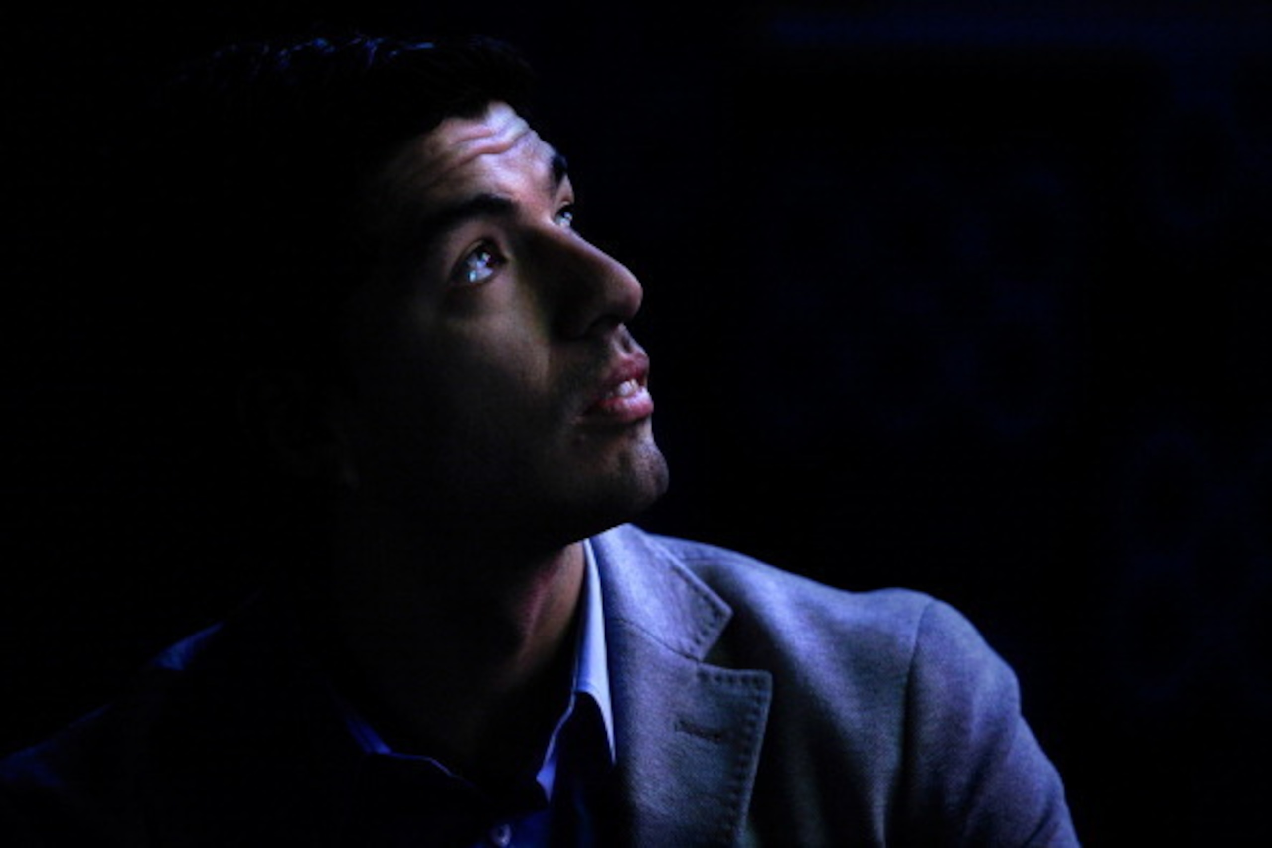 BARCELONA, SPAIN - MAY 14:  Luis Suarez of Liverpool faces the media during the presentation as new Ambassador for 888poker on May 14, 2014 in Barcelona, Spain.  (Photo by David Ramos/Getty Images)