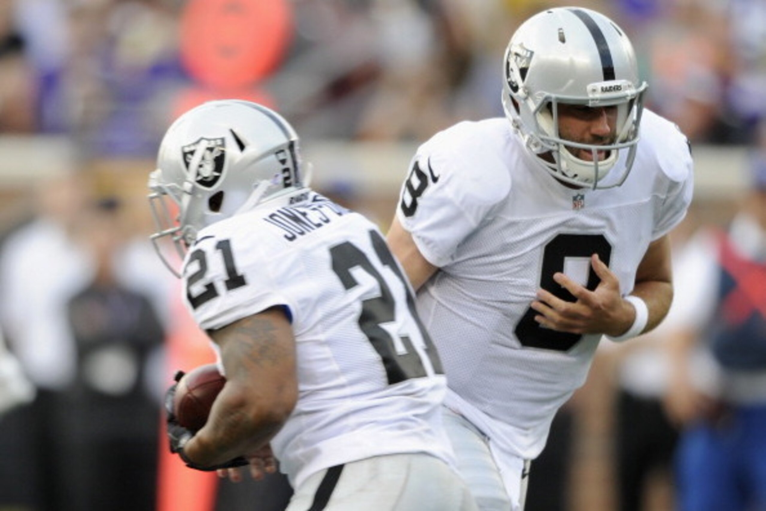 MINNEAPOLIS, MN - AUGUST 8: Matt Schaub #8 of the Oakland Raiders hands the ball to teammate Maurice Jones-Drew #21 during the first quarter of the game against the Minnesota Vikings on August 8, 2014 at TCF Bank Stadium in Minneapolis, Minnesota. (Photo 
