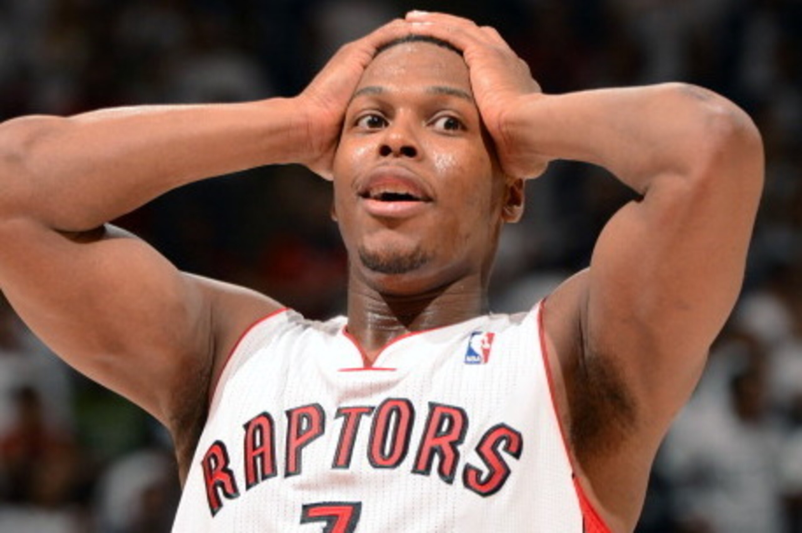 TORONTO, CANADA - April 30:  Kyle Lowry #7 of the Toronto Raptors reacts to a play in Game Five of the Eastern Conference Quarterfinals against the Brooklyn Nets furing the 2014 NBA Playoffs on April 30, 2014 at the Air Canada Centre in Toronto, Ontario, 