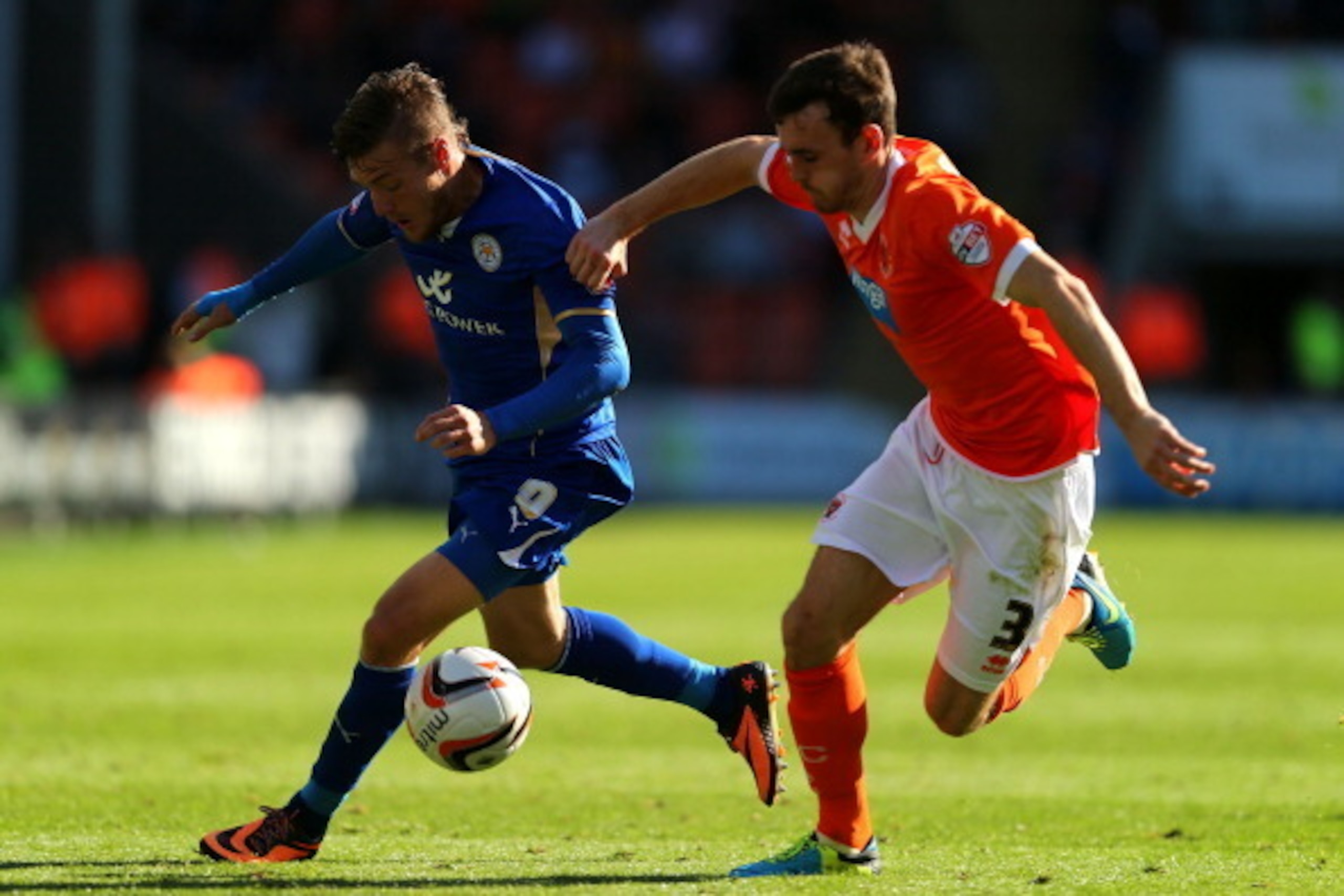 BLACKPOOL, ENGLAND - SEPTEMBER 21: Jamie Vardy of Leicester City is challenged by Jack Robinson of Blackpool during the Sky Bet Championship match between Blackpool and Leicester City at Bloomfield Road on September 21, 2013 in Blackpool, England, (Phot BLACKPOOL, ENGLAND - SEPTEMBER 21: Jamie Vardy of Leicester City is challenged by Jack Robinson of Blackpool during the Sky Bet Championship match between Blackpool and Leicester City at Bloomfield Road on September 21, 2013 in Blackpool, England, (Phot