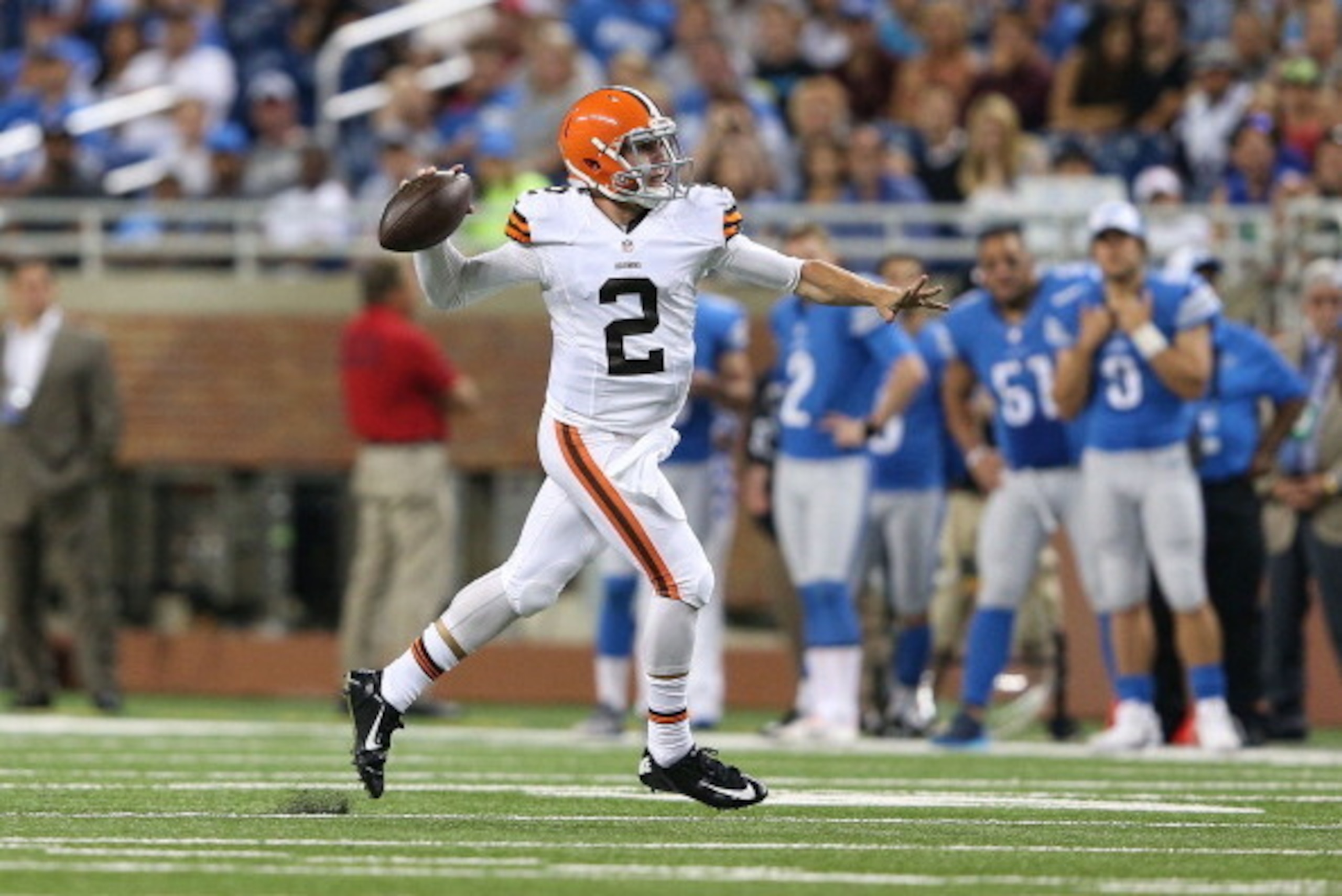 DETROIT, MI - AUGUST 09:  Quarterback Johnny Manziel #2 of the Cleveland Browns rolls out to pass during the third quarter of the preseason game against the Detroit Lions at Ford Field on August 9, 2014 in Detroit, Michigan. The Lions defeated the Browns