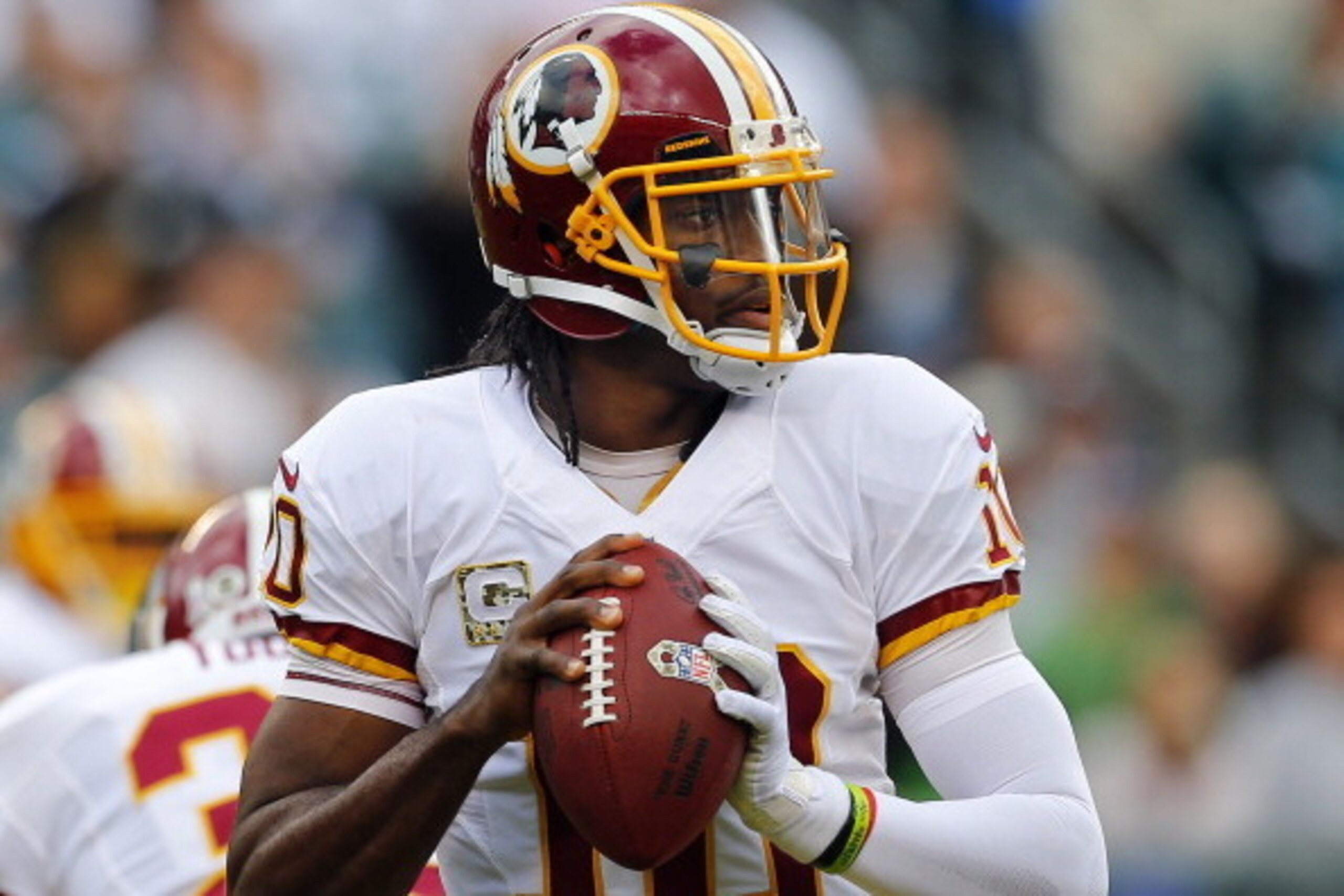 PHILADELPHIA, PA - NOVEMBER 17: Quarterback Robert Griffin III #10 of the Washington Redskins looks to pass during the first quarter of a game against the Philadelphia Eagles at Lincoln Financial Field on November 17, 2013 in Philadelphia, Pennsylvania. T