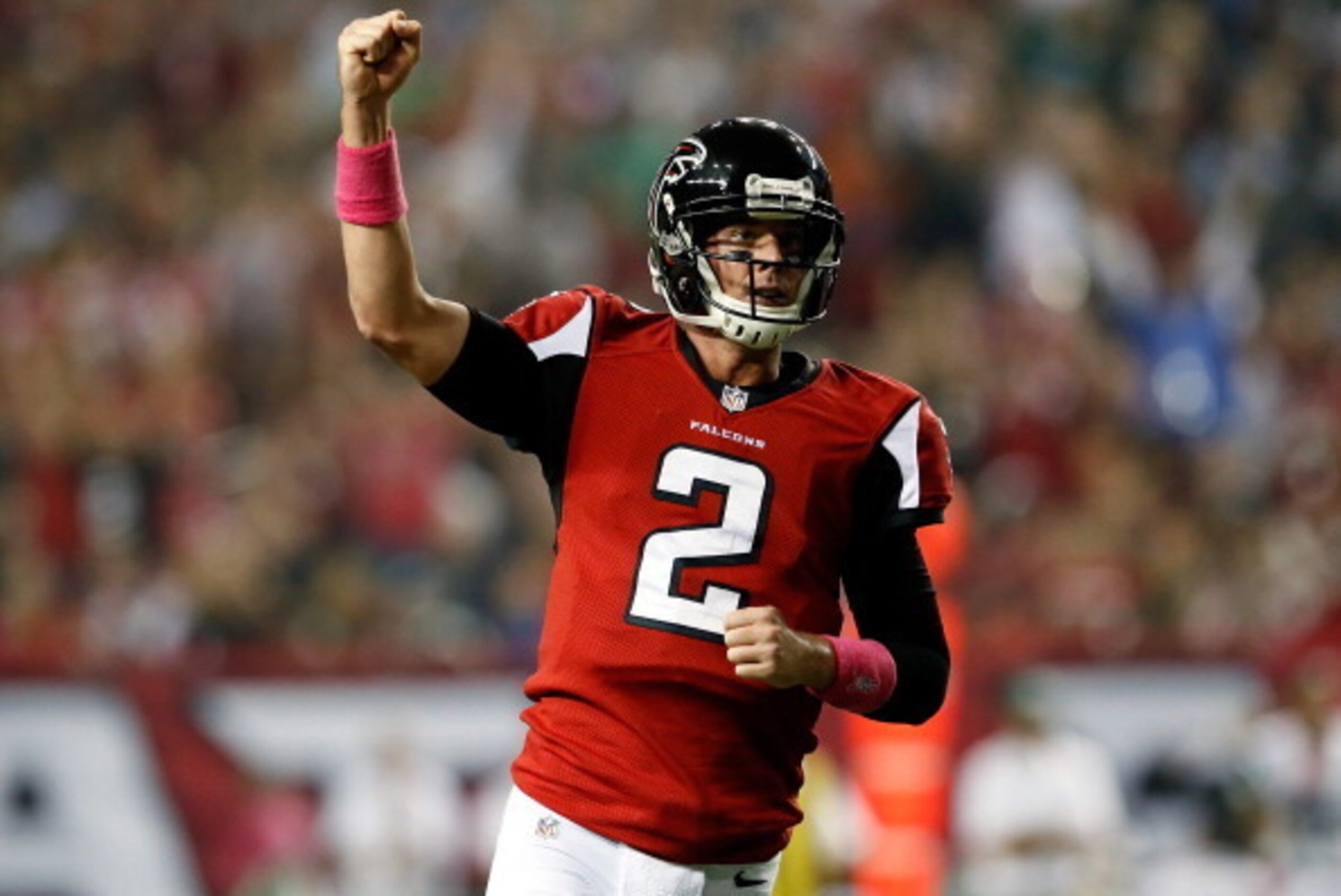 ATLANTA, GA - OCTOBER 07: Quarterback Matt Ryan #2 of the Atlanta Falcons celebrates a third quarter touchdown by running back Jacquizz Rodgers #32  against the New York Jets during their game at the Georgia Dome on October 7, 2013 in Atlanta, Georgia.  (