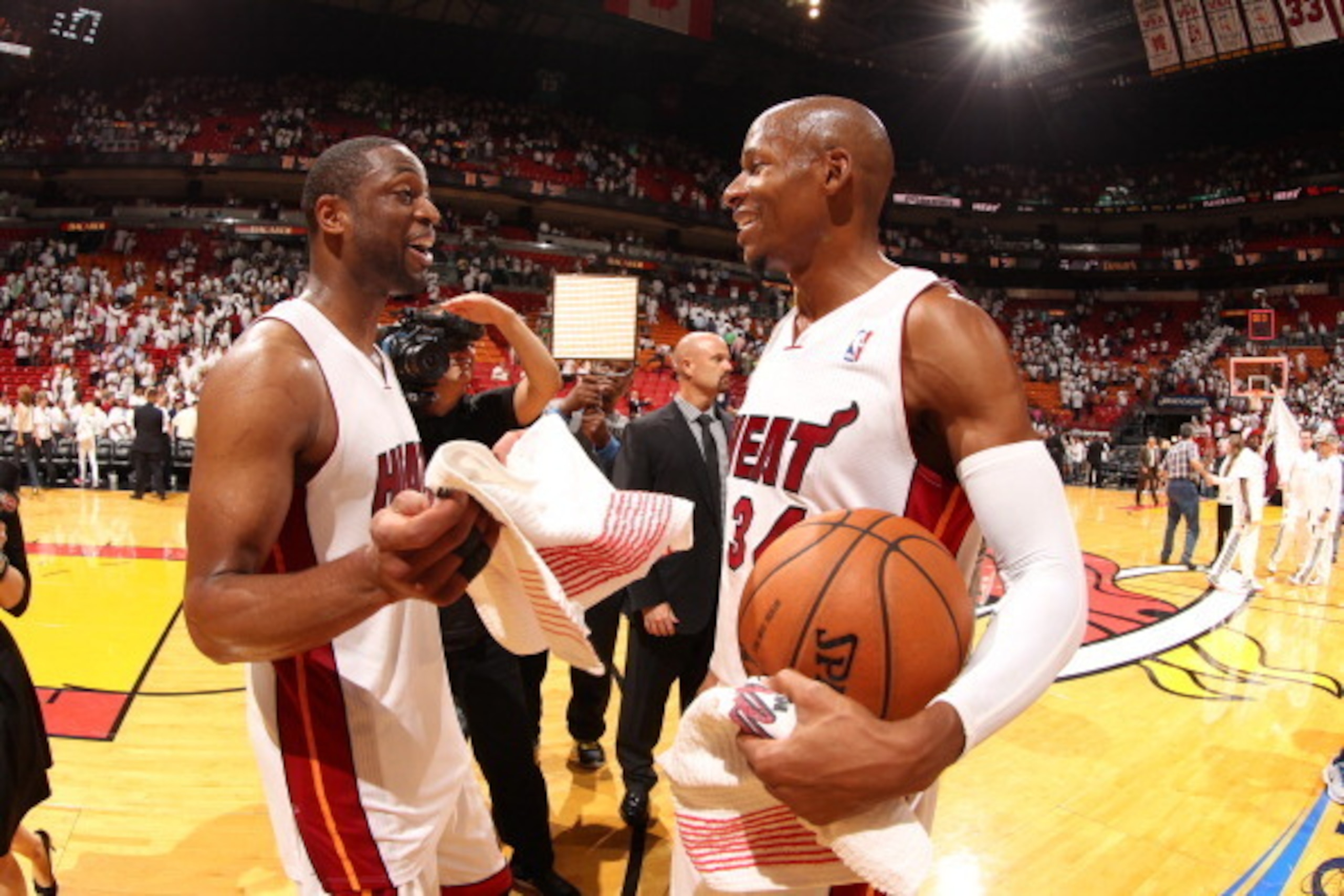 MIAMI, FL - MAY 14: Ray Allen #34 and Dwyane Wade #3 of the Miami Heat celebrate after Game Five of the Eastern Conference Semifinals against the Brooklyn Nets during the 2014 NBA playoffs at American Airlines Arena in Miami, Florida on May 14, 2014.  NOT