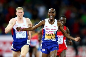 ZURICH, SWITZERLAND - AUGUST 13:  Mo Farah of Great Britain and Northern Ireland celebrates winning gold as Andy Vernon of Great Britain and Northern Ireland (L) wins silver in the Men's 10,000 metres final  during day two of the 22nd European Athletics C