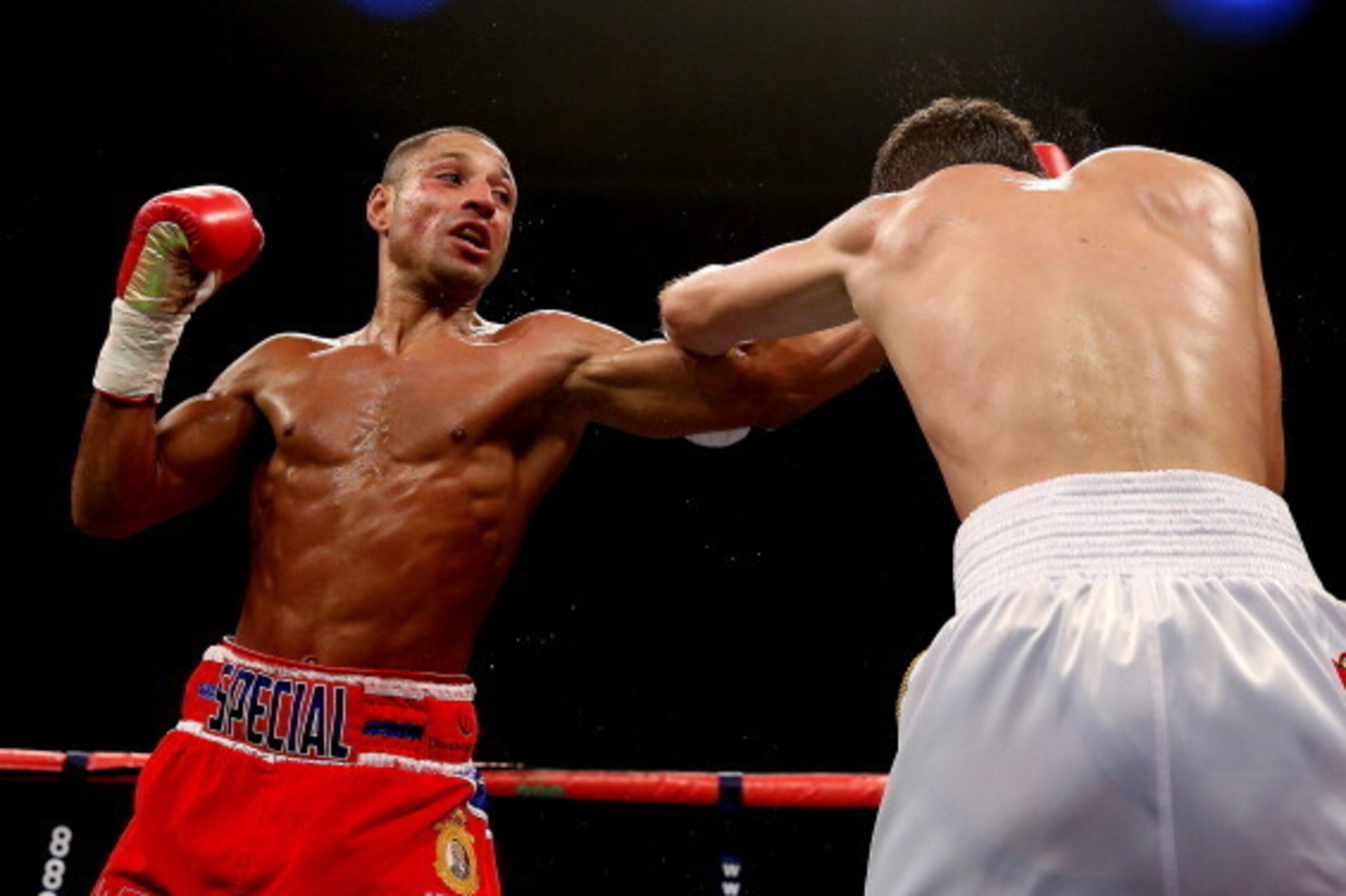 SHEFFIELD, ENGLAND - OCTOBER 26:  Kell Brook (L) in action with Vyacheslav Senchenko during their Final Eliminator for the IBF World Welterweight Championship bout at Motorpoint Arena on October 26, 2013 in Sheffield, England.  (Photo by Scott Heavey/Gett