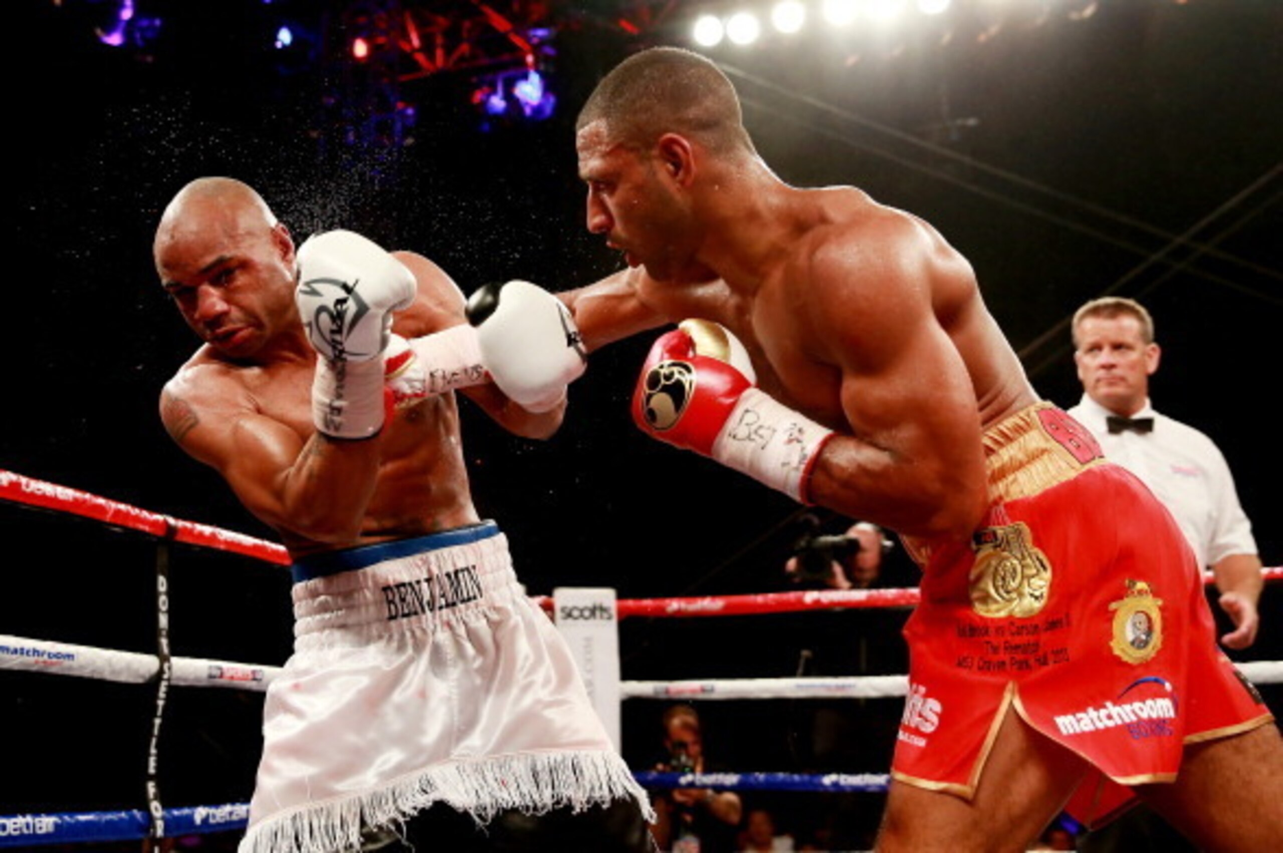 HULL, ENGLAND - JULY 13:  Kell Brook in action with Carson Jones during their International Welterweight bout at Craven Park Stadium on July 13, 2013 in Hull, England.  (Photo by Scott Heavey/Getty Images)