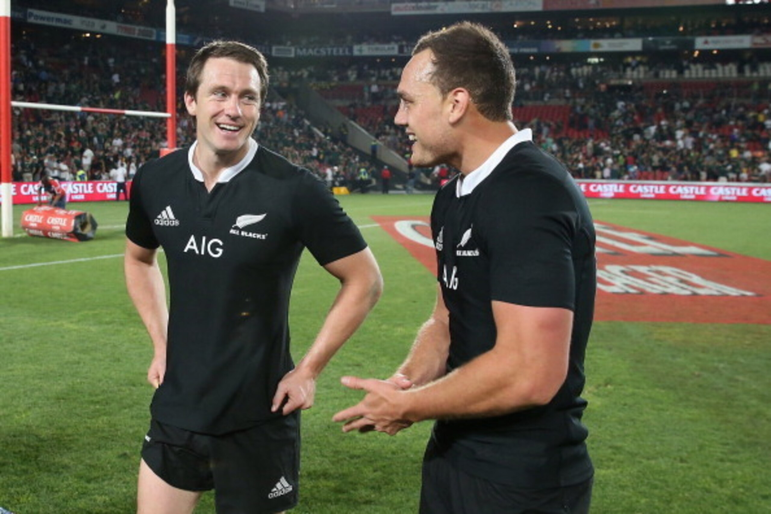 JOHANNESBURG, SOUTH AFRICA - OCTOBER 05:  Ben Smith (L) and Israel Dagg of the All Blacks celebrate after winning the Rugby Championship after their victory during the Rugby Championship match between South Africa Springboks and the New Zealand All Blacks