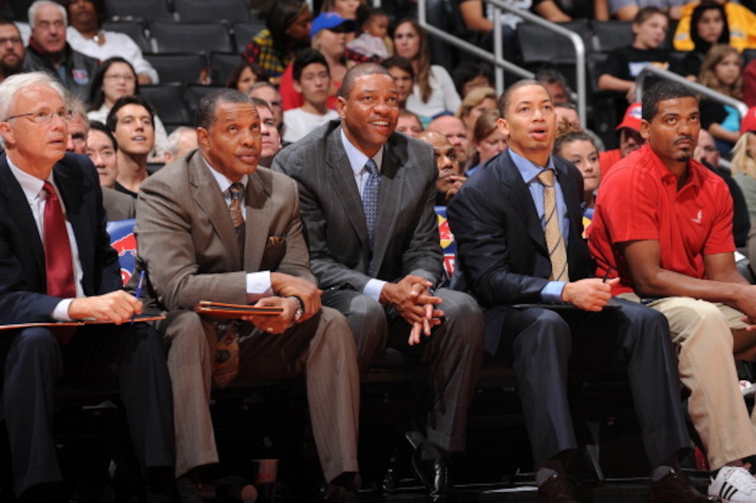 LOS ANGELES, CA - OCTOBER 18: Doc Rivers (C) of the Los Angeles Clippers sits with (L-R) assistant coach Kevin Eastman, Alvin Gentry, Tyronn Lue, and head athletic trainer Jasen Powell during their game against the Portland Trail Blazers at Staples Center LOS ANGELES, CA - OCTOBER 18: Doc Rivers (C) of the Los Angeles Clippers sits with (L-R) assistant coach Kevin Eastman, Alvin Gentry, Tyronn Lue, and head athletic trainer Jasen Powell during their game against the Portland Trail Blazers at Staples Center