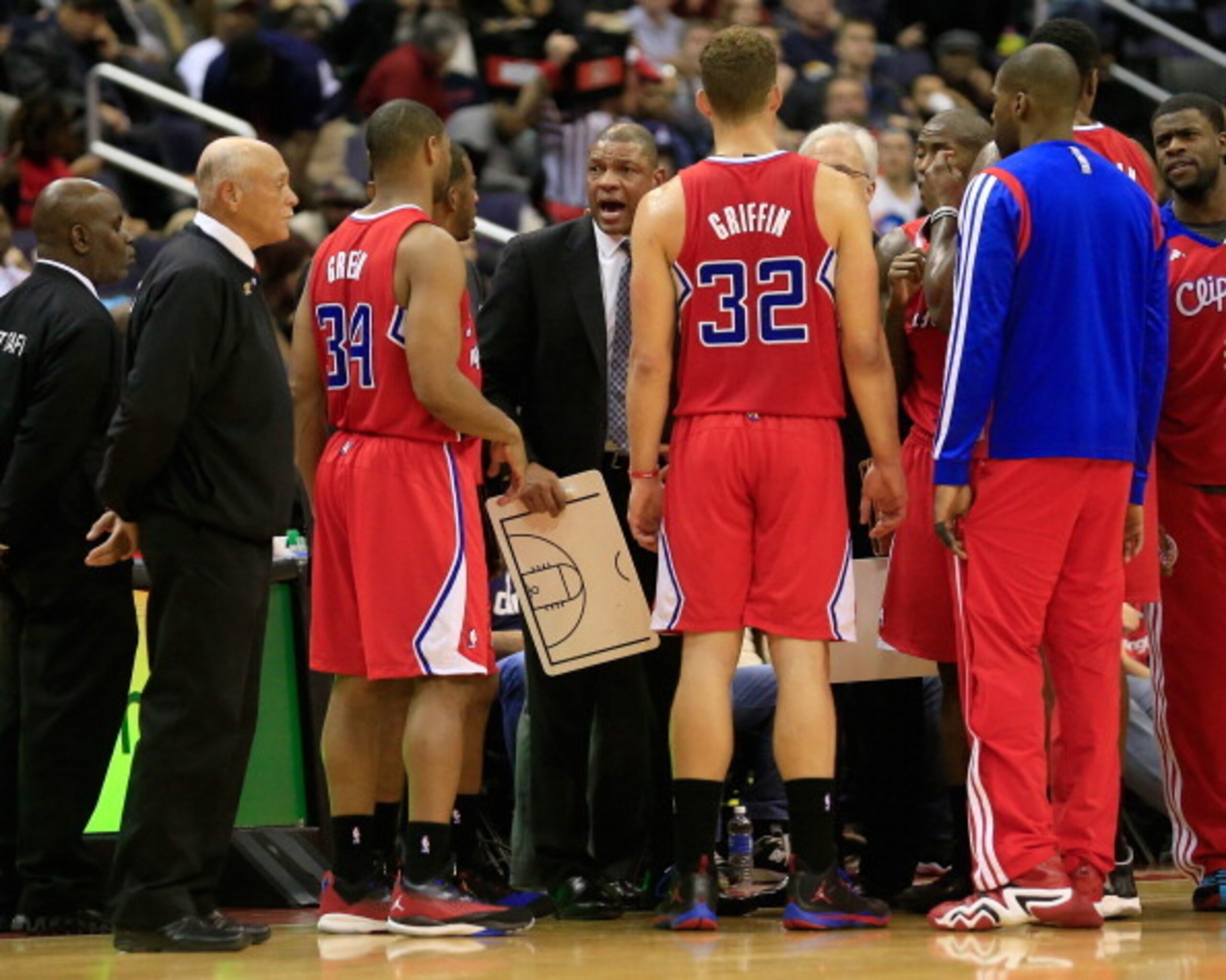 WASHINGTON, DC - DECEMBER 14: Head coach Doc Rivers of the Los Angeles Clippers talks with his team during a second half timeout against the Washington Wizards at Verizon Center on December 14, 2013 in Washington, DC. NOTE TO USER: User expressly acknowle WASHINGTON, DC - DECEMBER 14: Head coach Doc Rivers of the Los Angeles Clippers talks with his team during a second half timeout against the Washington Wizards at Verizon Center on December 14, 2013 in Washington, DC. NOTE TO USER: User expressly acknowle
