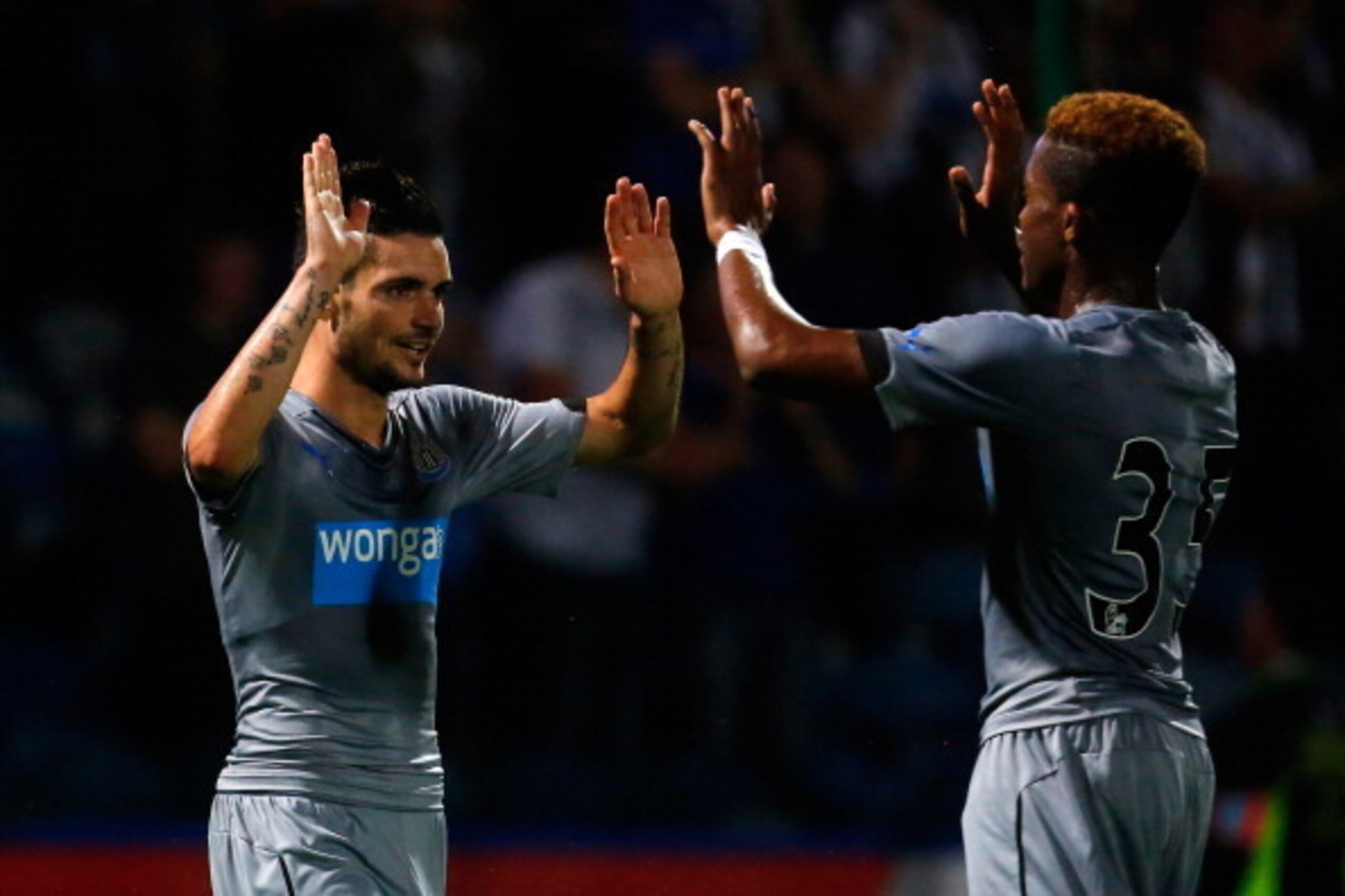 HUDDERSFIELD, ENGLAND - AUGUST 5: Remy Cabella (L) of Newcastle celebrates his goal during the Pre Season Friendly match between Huddersfield Town and Newcastle United at the John Smith's Stadium on August 5, 2014 in Huddersfield, England. (Photo by Paul 