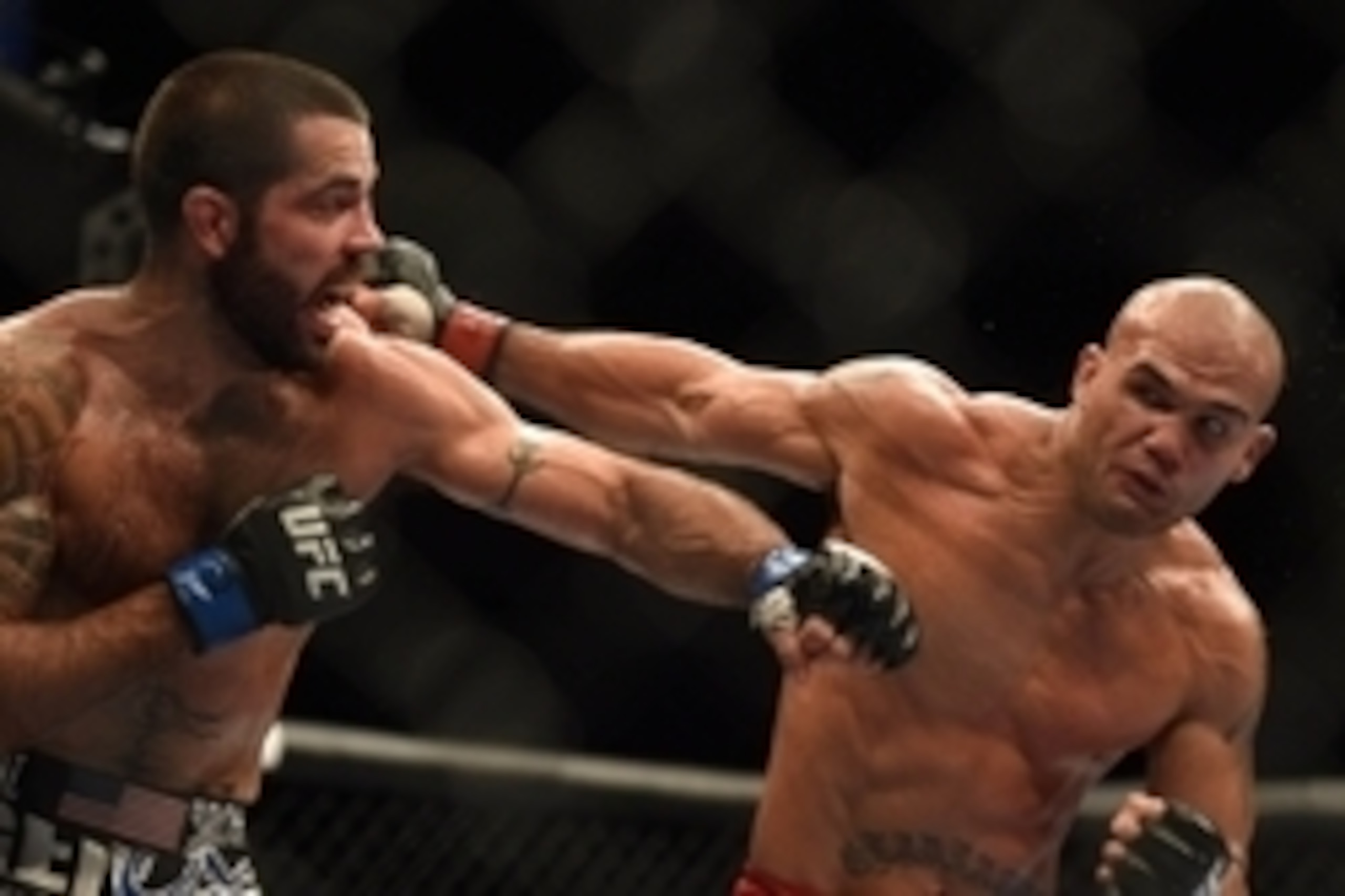 July 26, 2014; San Jose, CA, USA; Robbie Lawler (red gloves) punches Matt Brown (blue gloves) during the welterweight bout of the FOX UFC Saturday at SAP Center. Mandatory Credit: Kyle Terada-USA TODAY Sports July 26, 2014; San Jose, CA, USA; Robbie Lawler (red gloves) punches Matt Brown (blue gloves) during the welterweight bout of the FOX UFC Saturday at SAP Center. Mandatory Credit: Kyle Terada-USA TODAY Sports