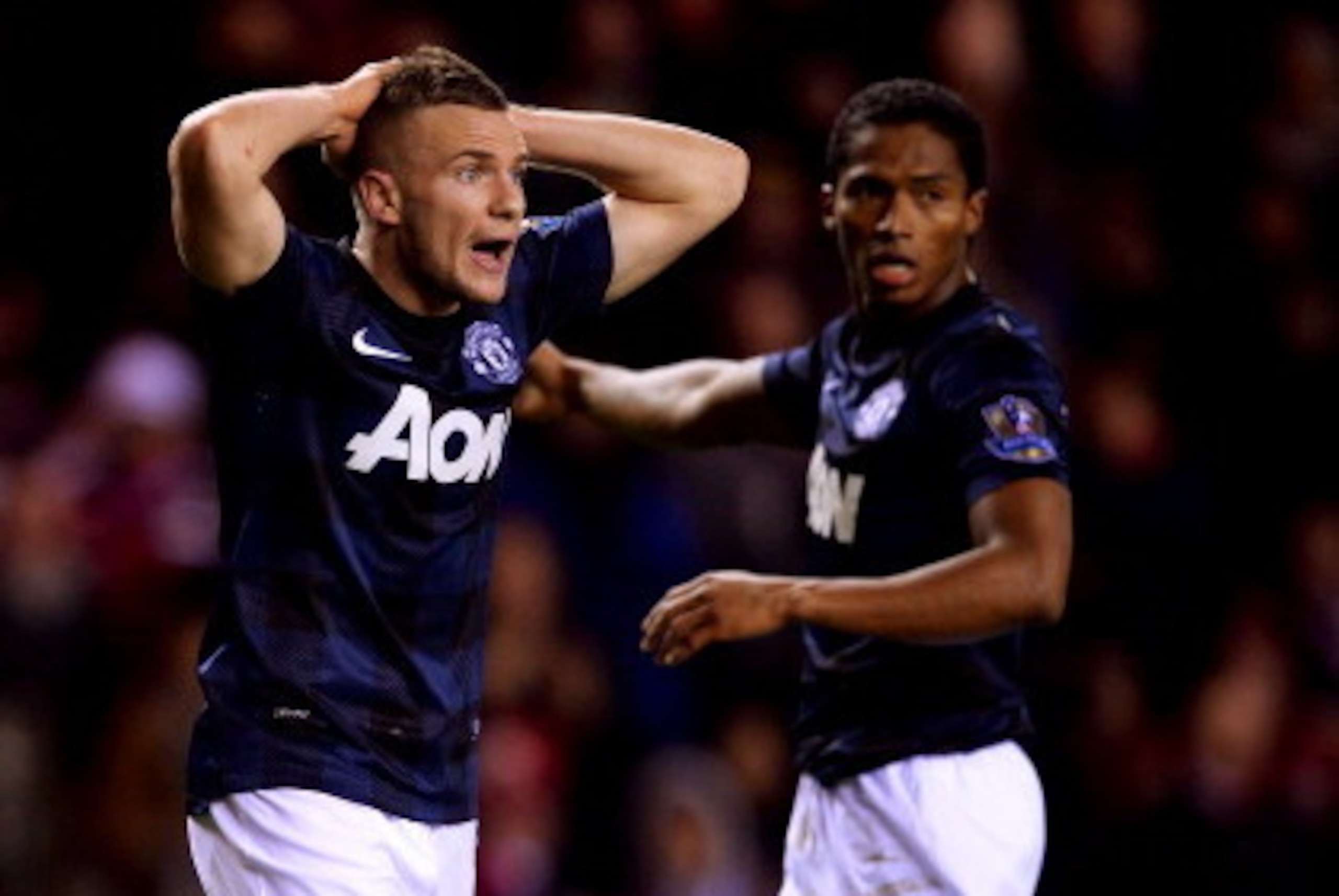 SUNDERLAND, ENGLAND - JANUARY 07:  Tom Cleverley of Manchester United (L) reacts during the Capital One Cup Semi-Final, first leg match between Sunderland and Manchester United at Stadium of Light on January 7, 2014 in Sunderland, England.  (Photo by Laur