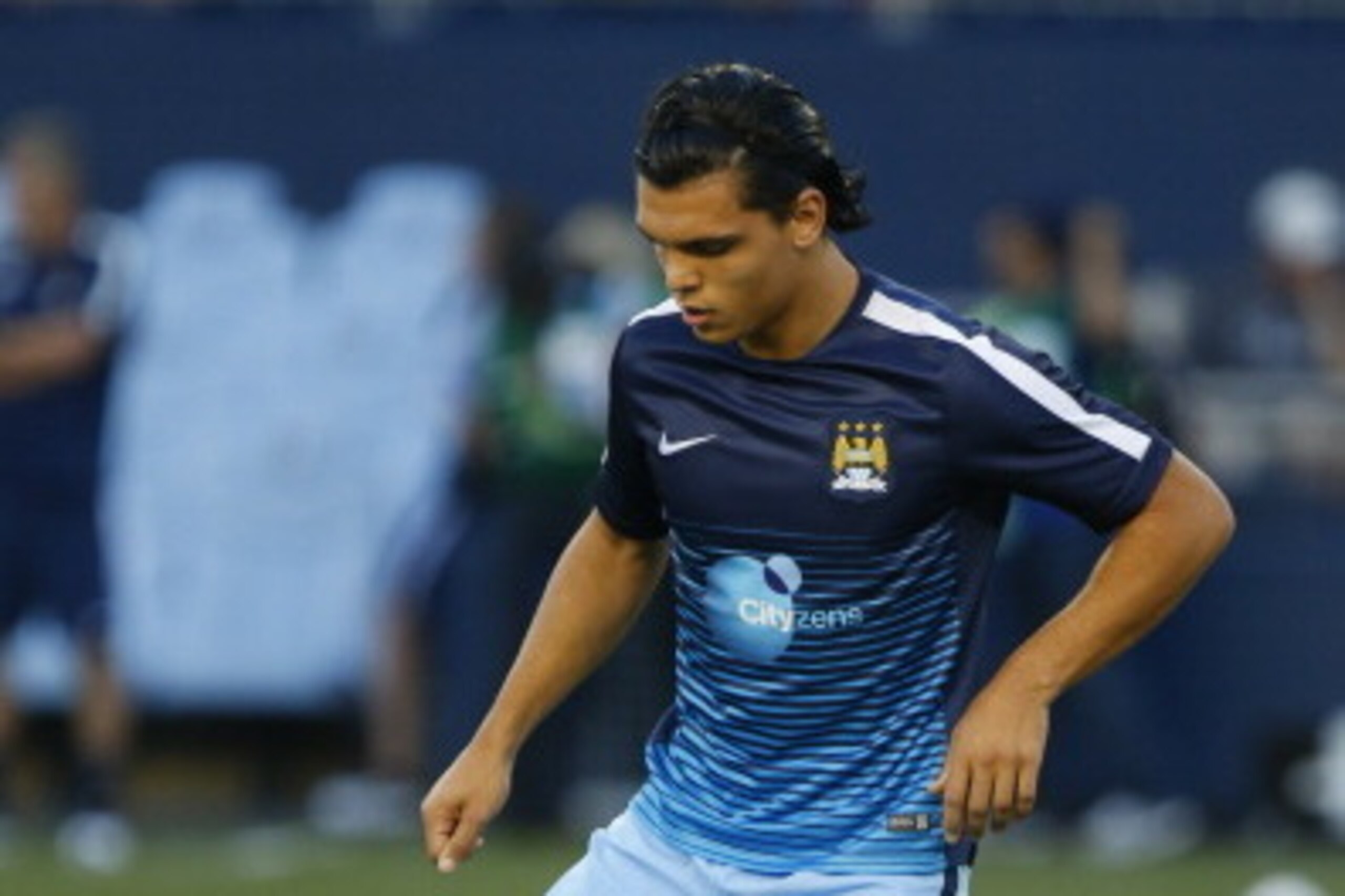 KANSAS CITY, KS - JULY 23: Karim Rekik #19 of Manchester City warms up before the game against Sporting KC on July 23rd at Sporting Park in Kansas City, Kansas. (Photo by Kyle Rivas/Getty Images)