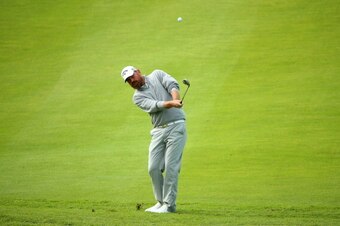 AALBORG, DENMARK - AUGUST 14:  Thomas Bjorn of Denmark hits his second shot on the 17th hole during the first round of the Made In Denmark at Himmerland Golf & Spa Resort on August 14, 2014 in Aalborg, Denmark.  (Photo by Andrew Redington/Getty Images)
