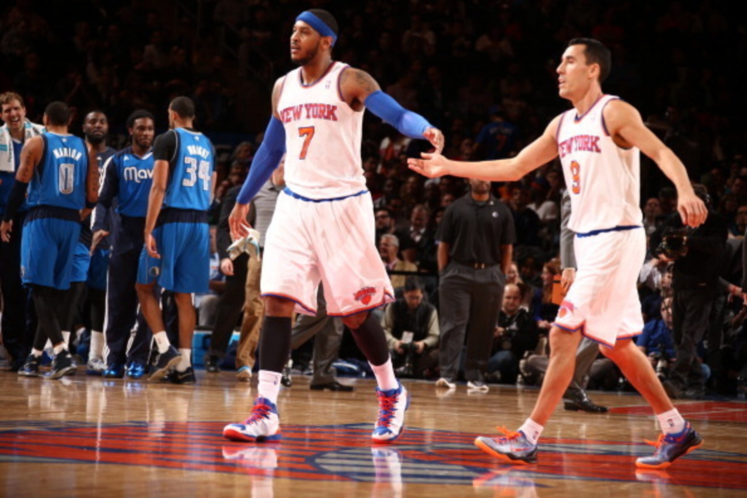 NEW YORK, NY - FEBRUARY 24: Carmelo Anthony #7 of the New York Knicks and Pablo Prigioni #9 of the New York Knicks celebrate during a game at Madison Square Garden in New York City. NOTE TO USER: User expressly acknowledges and agrees that, by downloading