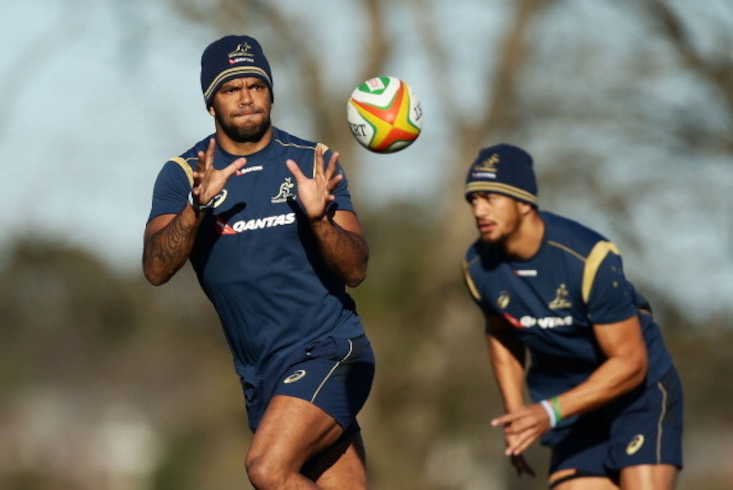 BATHURST, AUSTRALIA - AUGUST 07:  Kurtley Beale of the Wallabies takes a pass during an Australian Wallabies training session at Bathurst Bulldogs RUFC on August 7, 2014 in Bathurst, Australia.  (Photo by Matt King/Getty Images)
