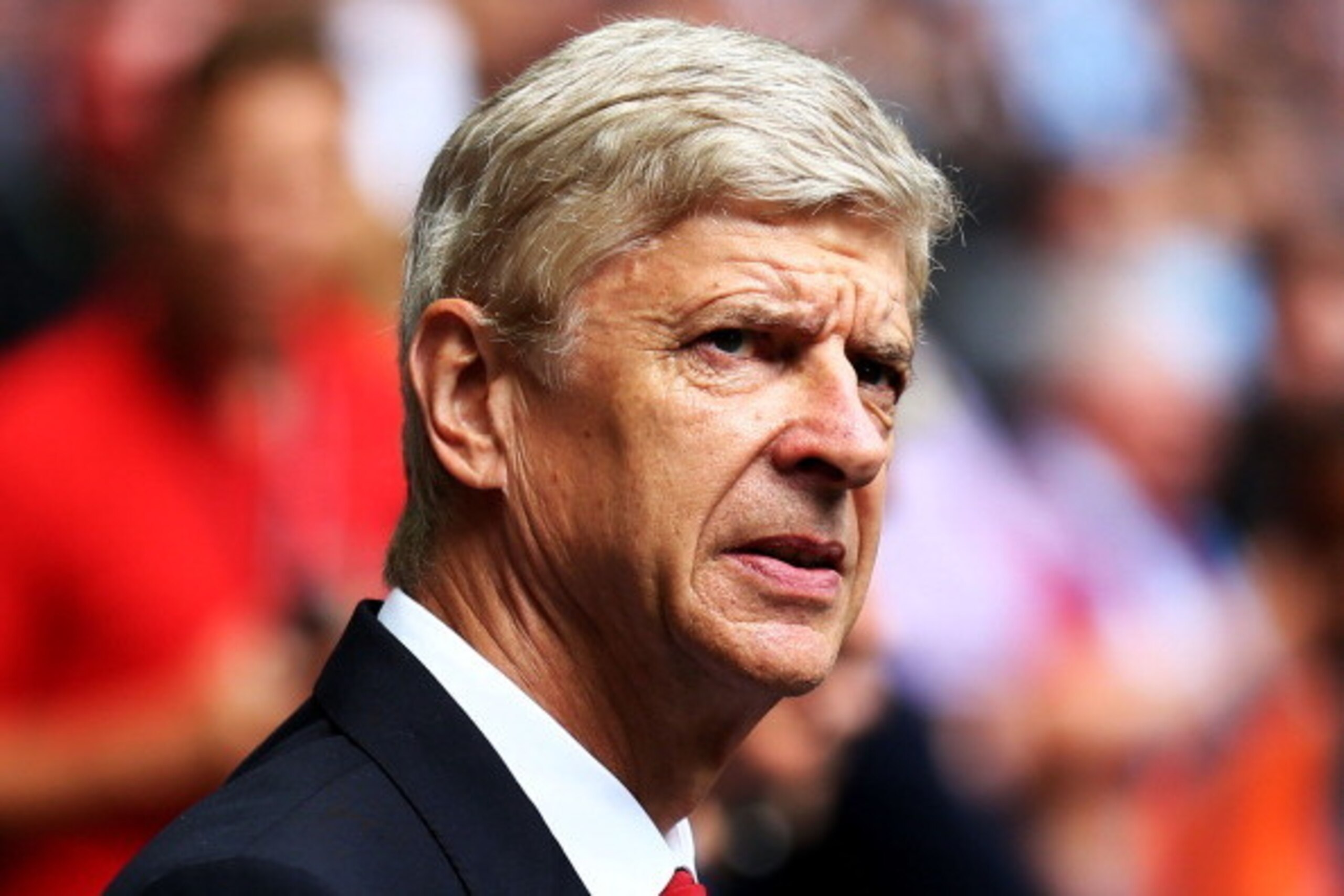 LONDON, ENGLAND - AUGUST 10: Arsene Wenger, manager of Arsenal looks on during the FA Community Shield match Manchester City and Arsenal at Wembley Stadium on August 10, 2014 in London, England.  (Photo by Clive Mason/Getty Images)