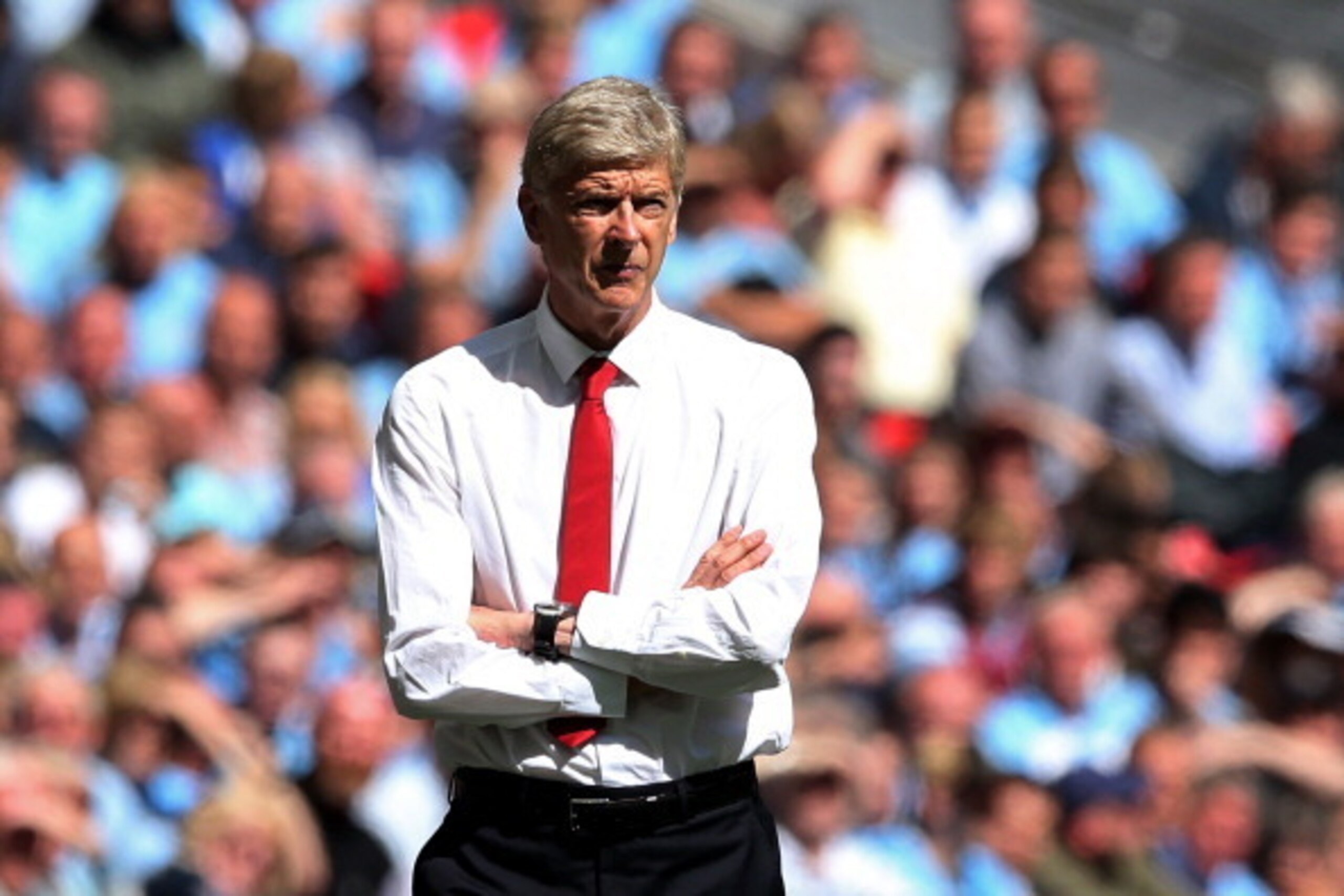 LONDON, ENGLAND - AUGUST 10:  Arsene Wenger, manager of Arsenal looks on during the FA Community Shield match Manchester City and Arsenal at Wembley Stadium on August 10, 2014 in London, England.  (Photo by David Rogers/Getty Images)