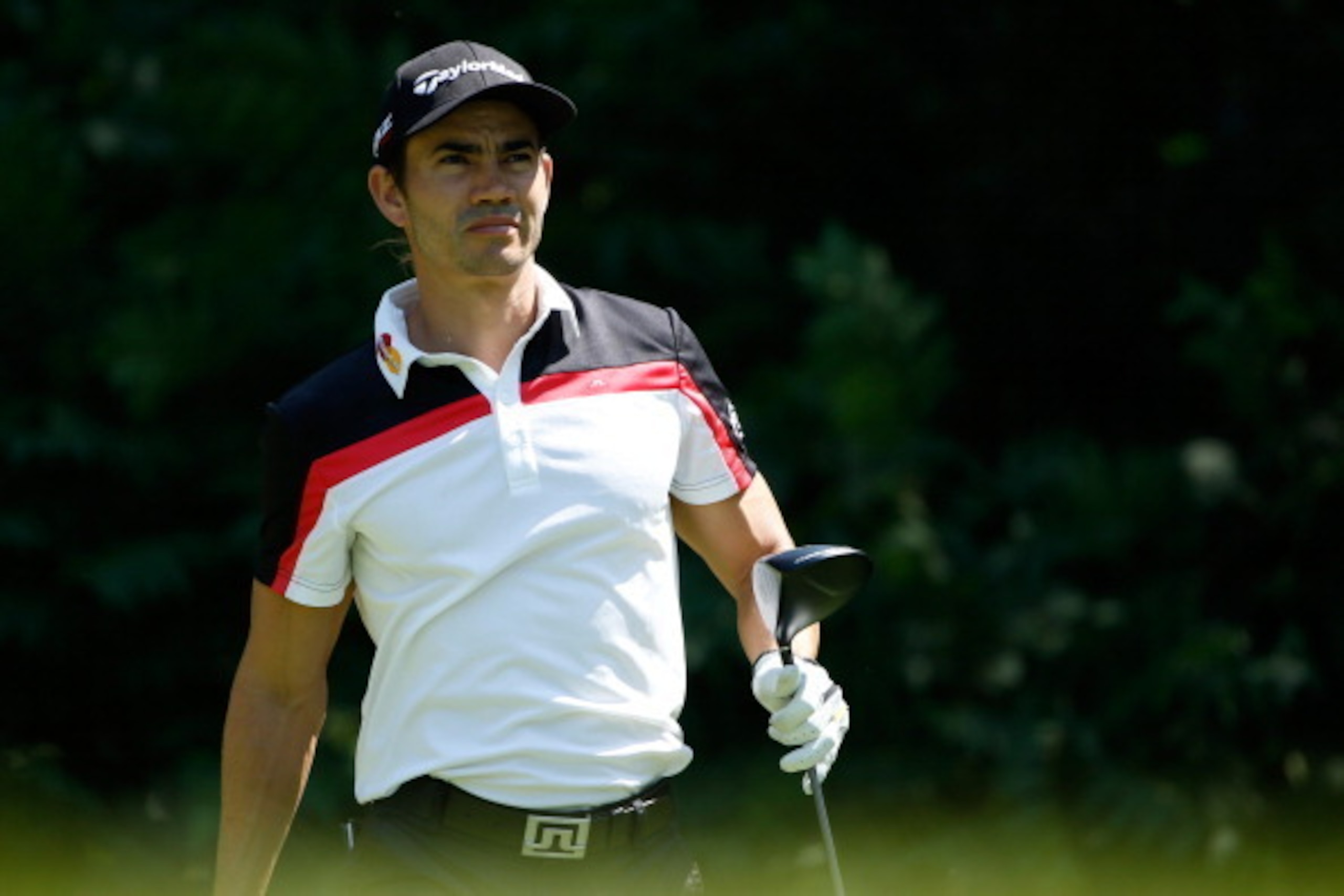 SILVIS, IL - JULY 10:  Camilo Villegas of Colombia tees off on the second hole during the first round of the John Deere Classic held at TPC Deere Run on July 10, 2014 in Silvis, Illinois.  (Photo by Gregory Shamus/Getty Images)