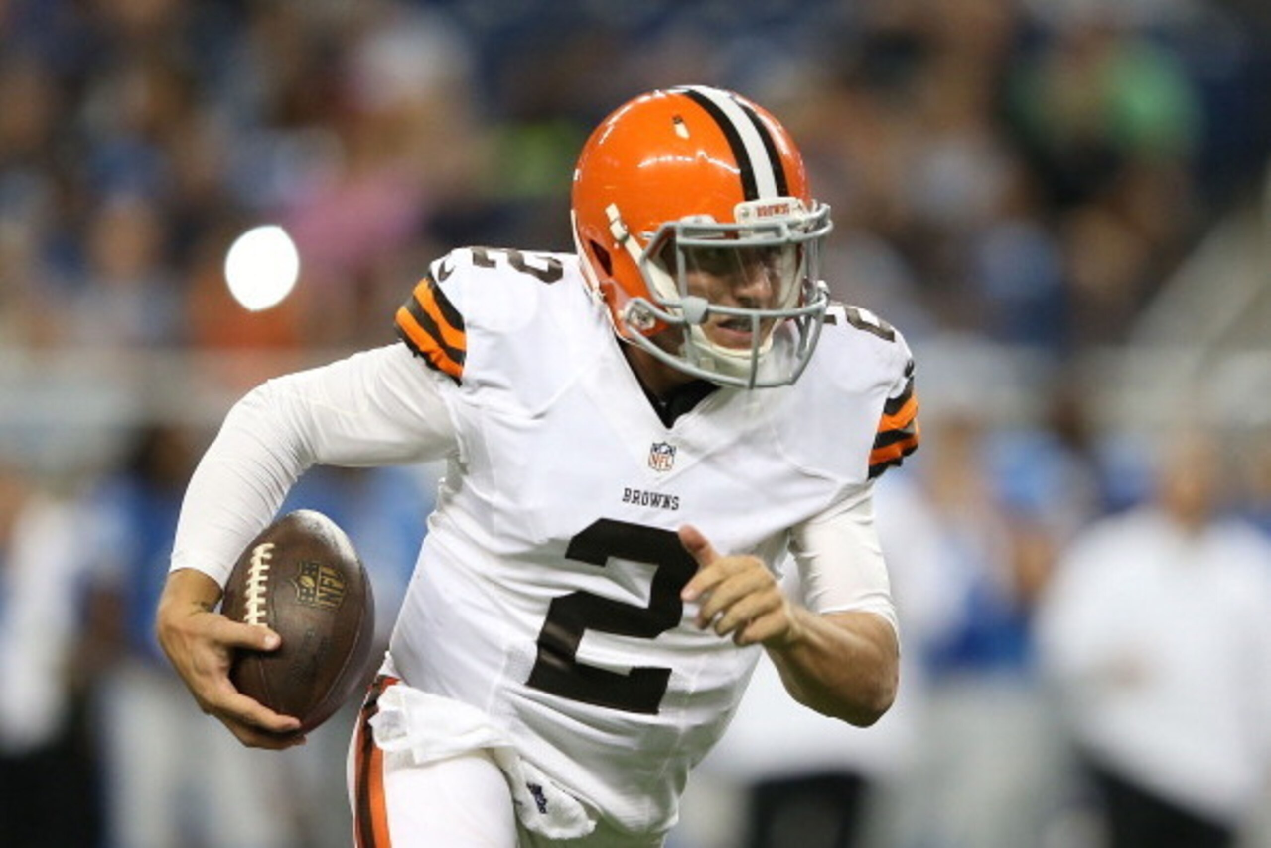 DETROIT, MI - AUGUST 09:  Johnny Manziel #2 of the Cleveland Browns runs for a 16 yard gain during the third quarter the preseason game against the Detroit Lions at Ford Field on August 9, 2014 in Detroit, Michigan. The Lions defeated the Browns 13-12 in 