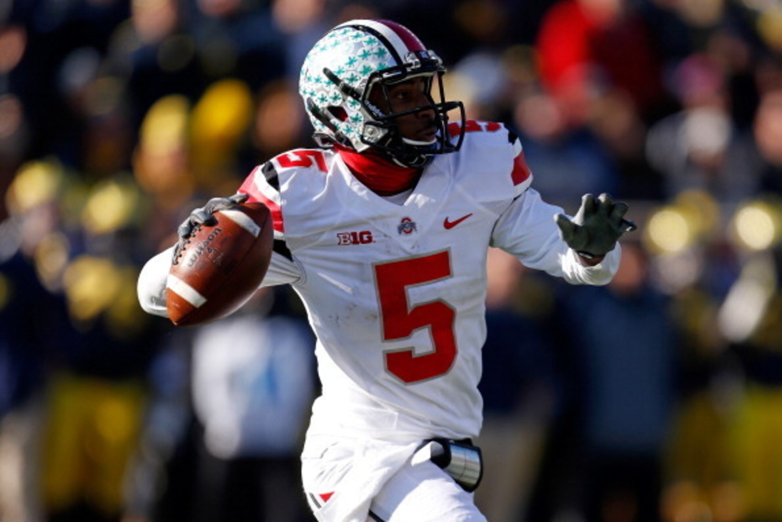 ANN ARBOR, MI - NOVEMBER 30: Quarterback Braxton Miller #5 of the Ohio State Buckeyes looks to pass in the second quarter against the Michigan Wolverines during a game at Michigan Stadium on November 30, 2013 in Ann Arbor, Michigan.  (Photo by Gregory Sha
