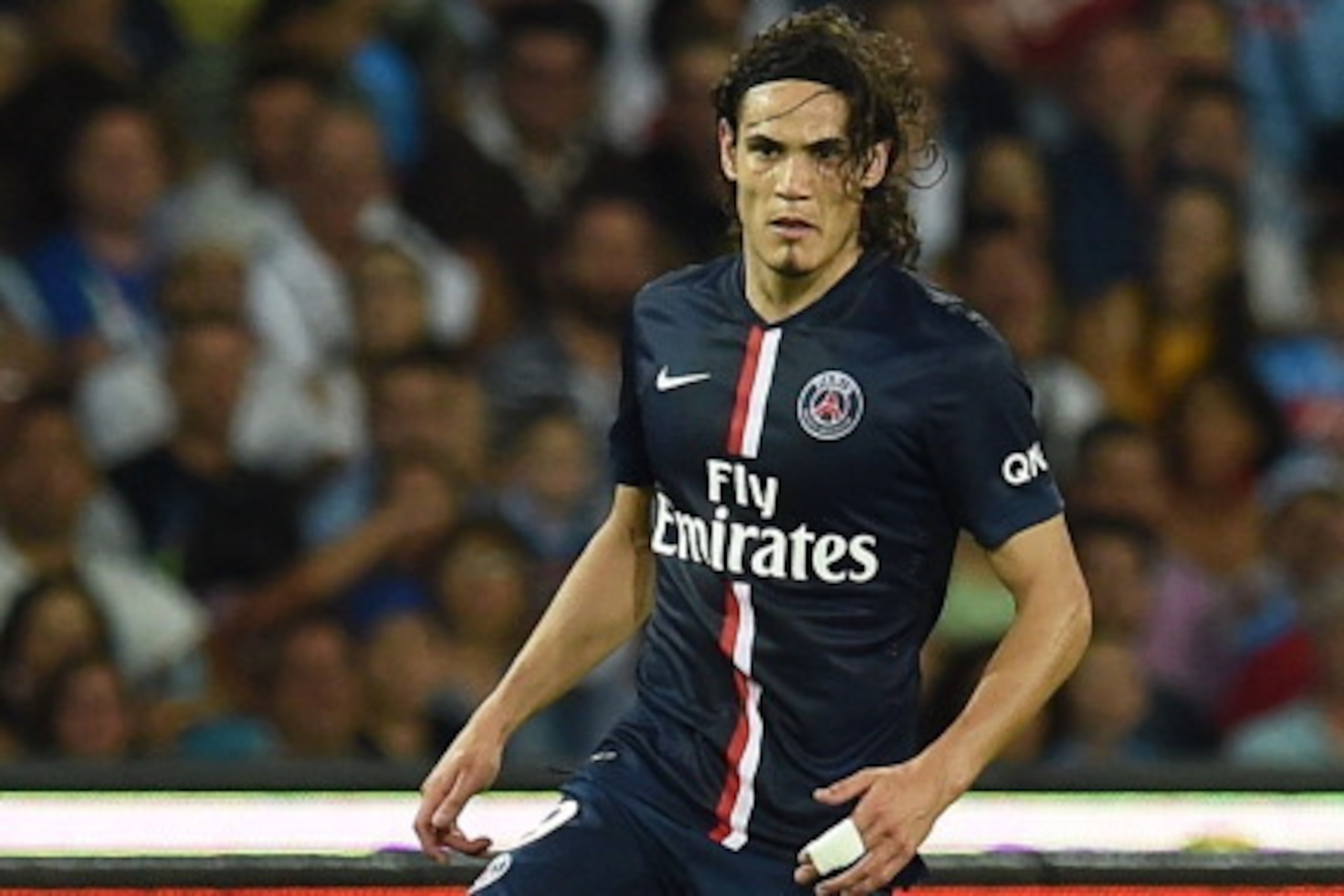 NAPLES, ITALY - AUGUST 11:  Edinson Cavani of Paris Saint Germain in action during the pre-season friendly match between SSC Napoli and Paris Saint-Germain FC at Stadio San Paolo on August 11, 2014 in Naples, Italy.  (Photo by Giuseppe Bellini/Getty Image
