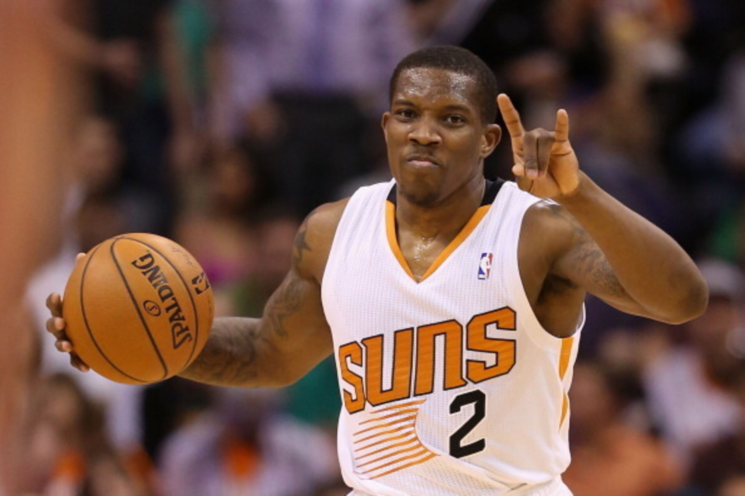 PHOENIX, AZ - MARCH 12:  Eric Bledsoe #2 of the Phoenix Suns handles the ball during the NBA game against the Cleveland Cavaliers at US Airways Center on March 12, 2014 in Phoenix, Arizona.  NOTE TO USER: User expressly acknowledges and agrees that, by do