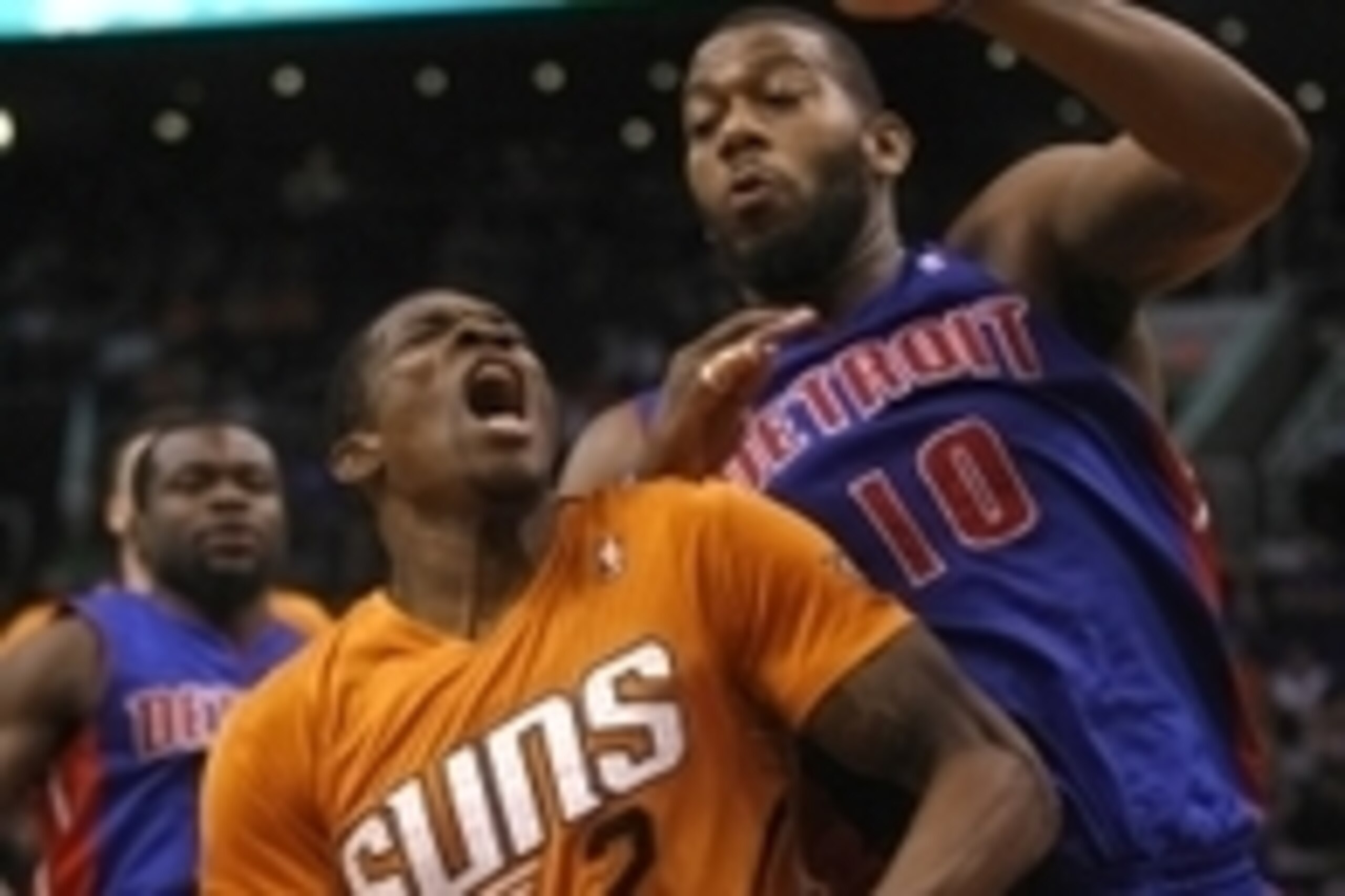Mar 21, 2014; Phoenix, AZ, USA; Phoenix Suns guard Eric Bledsoe (2) drwas the foul on Detroit Pistons forward Greg Monroe (10) in the third quarter at US Airways Center. Mandatory Credit: Rick Scuteri-USA TODAY Sports
