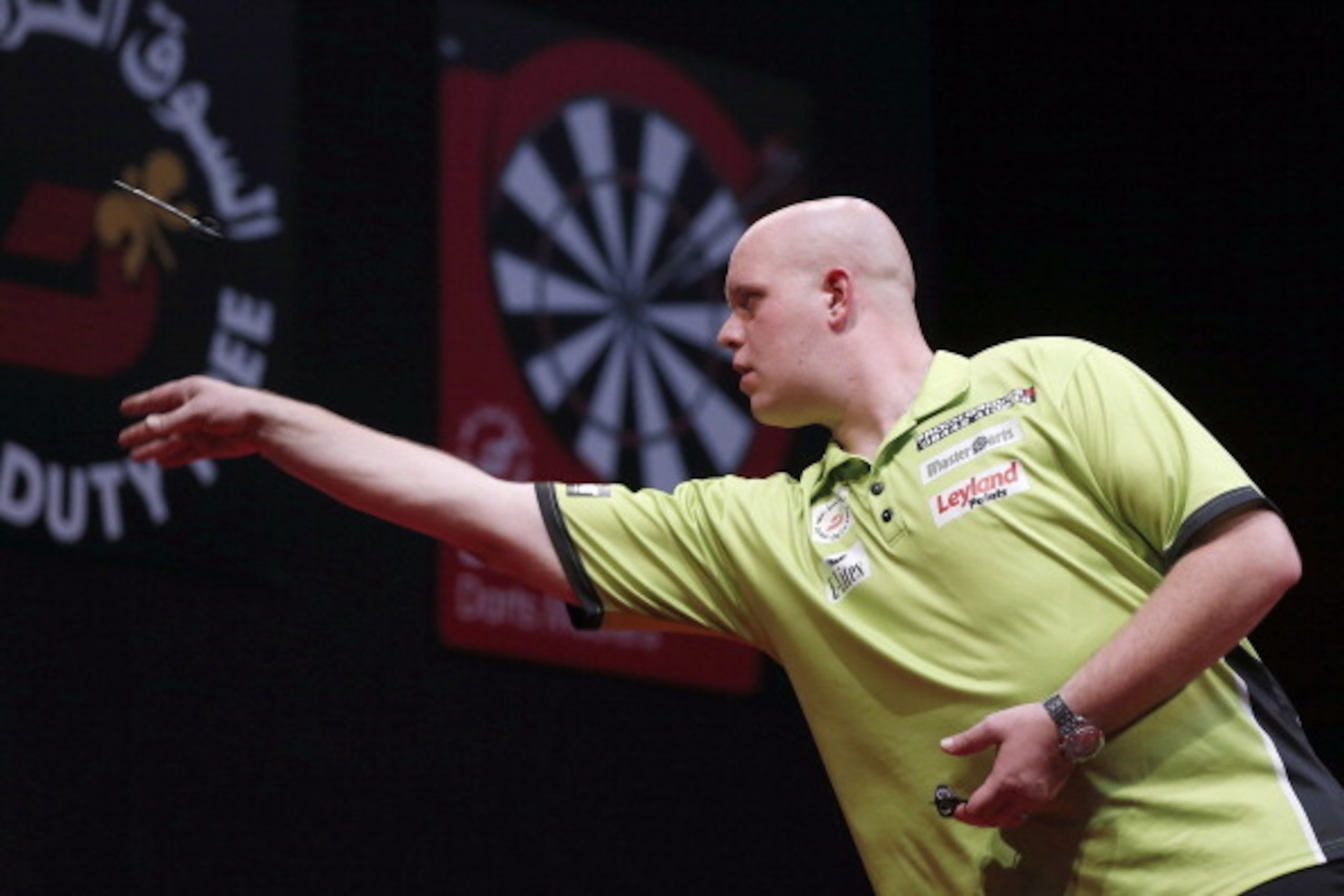DUBAI, UNITED ARAB EMIRATES - MAY 30:  Michael Van Gerwen of the Netherlands plays against Peter Wright of England during the 2014 Dubai Duty Free Darts Masters Final match at Dubai Duty Free Tennis Stadium, Irish Village on May 30, 2014 in Dubai, United 