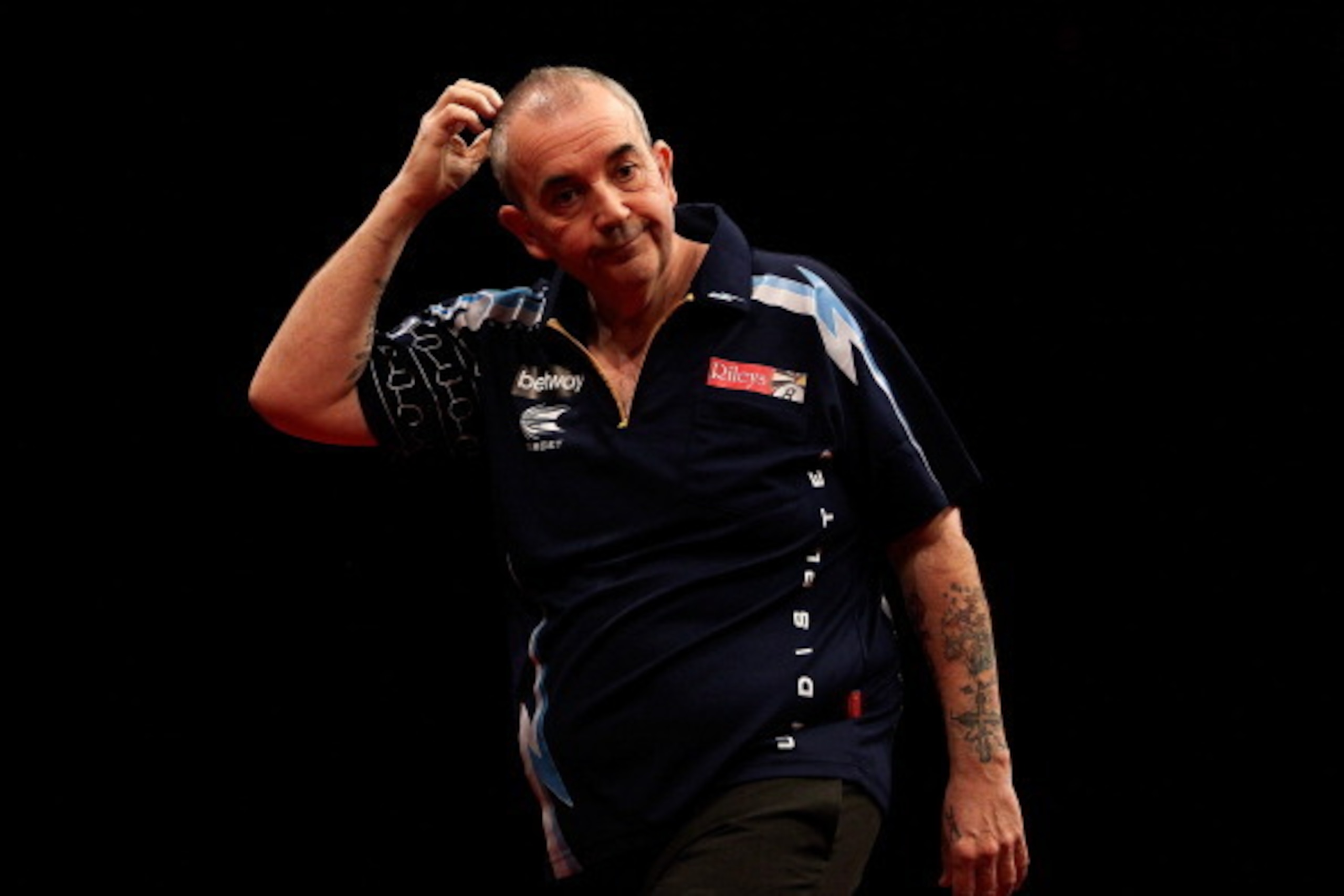 LONDON, ENGLAND - MAY 22:  Phil Taylor of England reacts during the McCoys Premier League Darts Play-Offs Semi Final match between Raymond van Barneveld and Phil Taylor at O2 Arena on May 22, 2014 in London, England.  (Photo by Ben Hoskins/Getty Images)