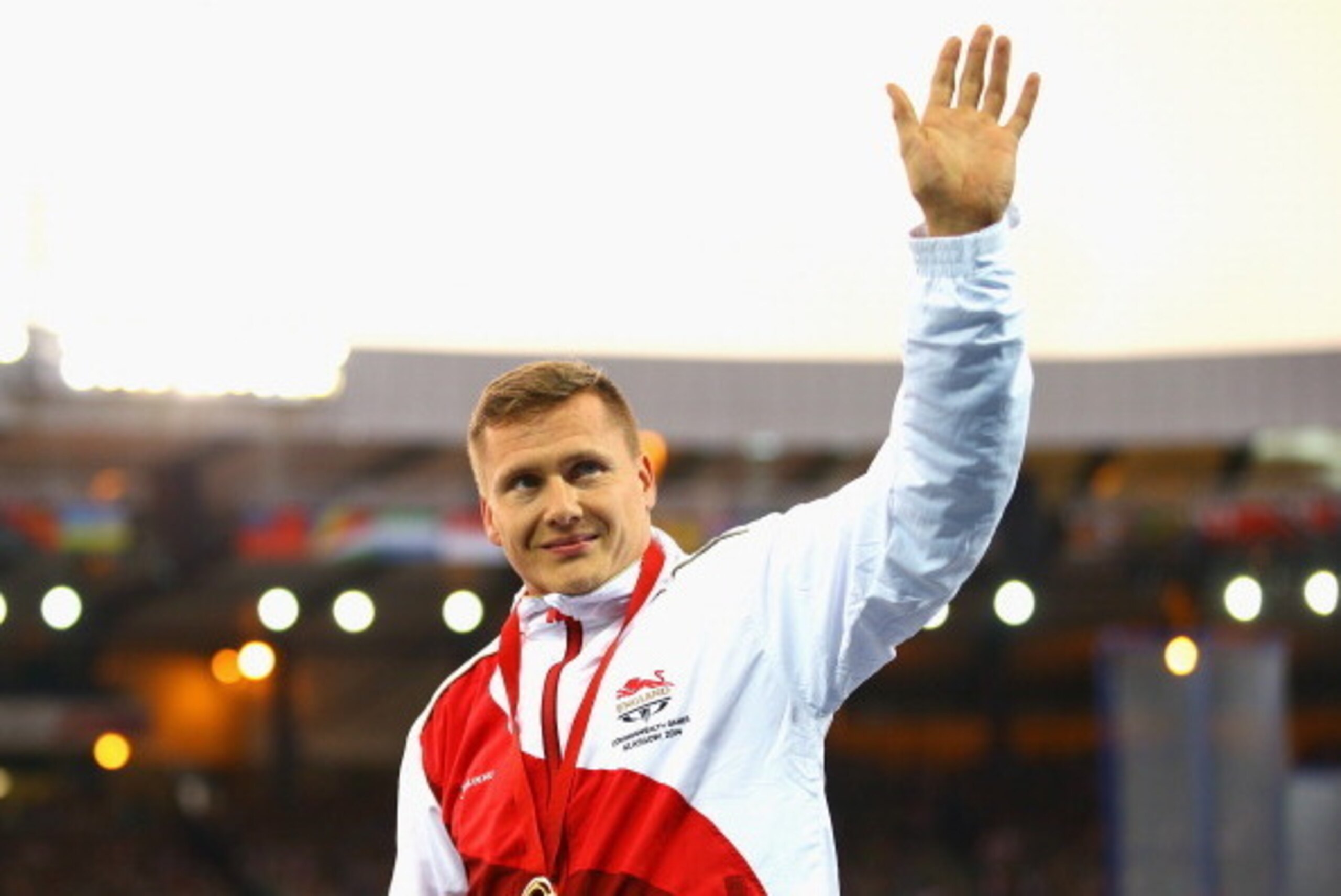 GLASGOW, SCOTLAND - JULY 31:  Gold medallist David Weir of England poses on the podium during the medal ceremony for the MenÂs Para Sport 1500 metres T54 at Hampden Park during day eight of the Glasgow 2014 Commonwealth Games on July 31, 2014 in Glasgow, 