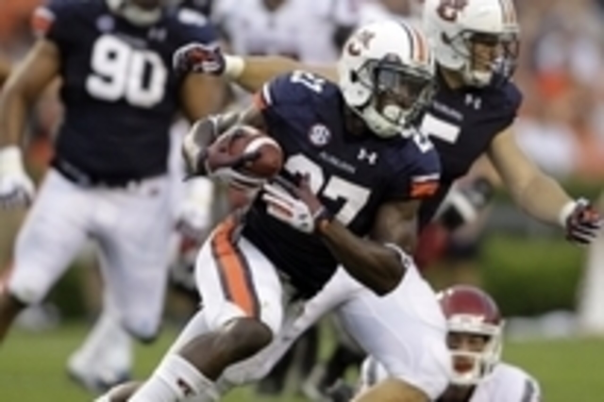Aug 31, 2013; Auburn, AL, USA; Auburn Tigers defensive back Robenson Therezie (27) returns an interception during the first half against the Washington State Cougars at Jordan Hare Stadium. Mandatory Credit: John Reed-USA TODAY Sports Aug 31, 2013; Auburn, AL, USA; Auburn Tigers defensive back Robenson Therezie (27) returns an interception during the first half against the Washington State Cougars at Jordan Hare Stadium. Mandatory Credit: John Reed-USA TODAY Sports