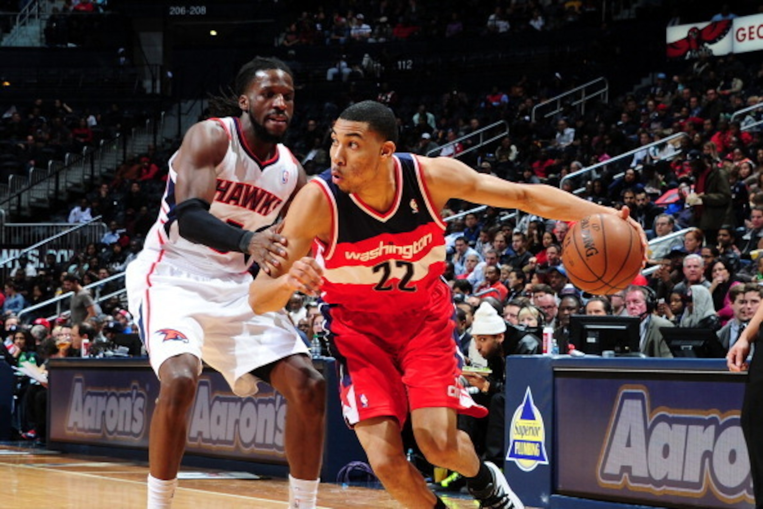 ATLANTA, GA - DECEMBER 13: Otto Porter Jr. #22 of the Washington Wizards drives to the basket against the Atlanta Hawks on December 13, 2013 at Philips Arena in Atlanta, Georgia.  NOTE TO USER: User expressly acknowledges and agrees that, by downloading a