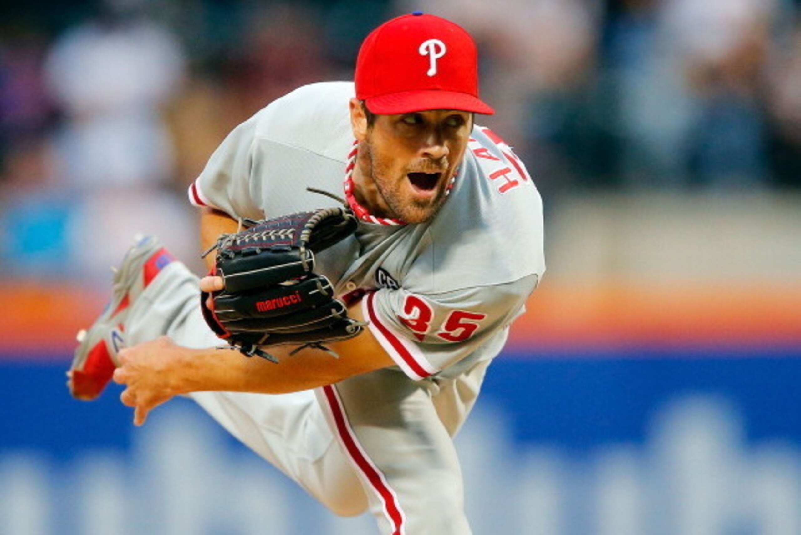NEW YORK, NY - JULY 29:  Cole Hamels #35 of the Philadelphia Phillies delivers a pitch in the first inning against the New York Mets at Citi Field on July 29, 2014 in the Flushing neighborhood of the Queens borough of New York City.  (Photo by Jim McIsaac