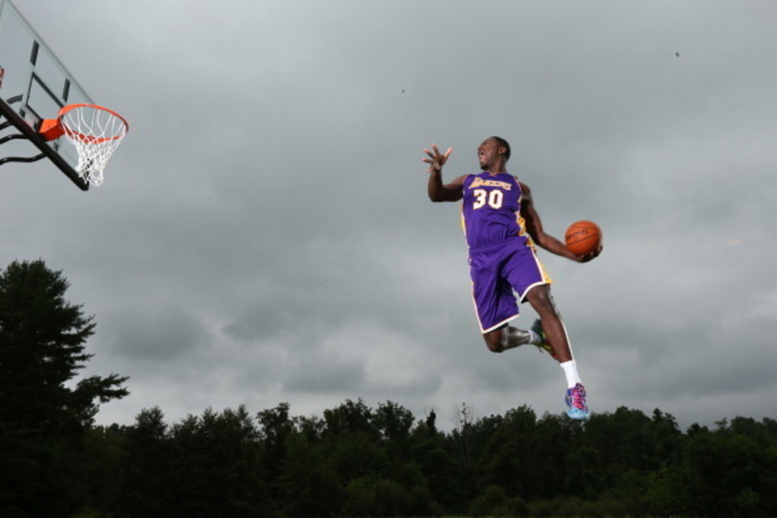 TARRYTOWN, NY - AUGUST 3: Julius Randle #30 of the Los Angeles Lakers poses for a portrait during the 2014 NBA rookie photo shoot on August 3, 2014 at the Madison Square Garden Training Facility in Tarrytown, New York. NOTE TO USER: User expressly acknowl