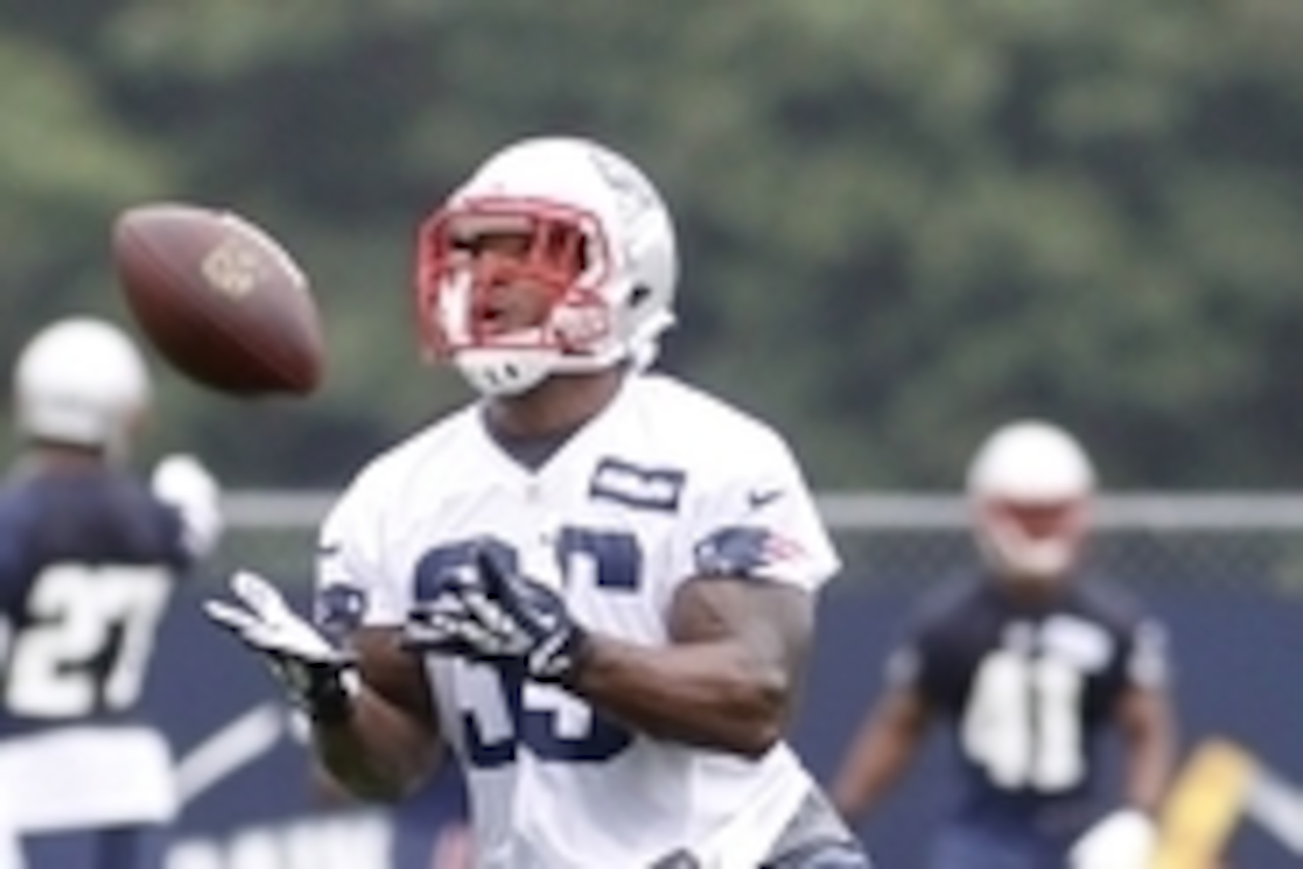 Jul 24, 2014; Foxborough, MA, USA; New England Patriots running back Jonas Gray (35) catches a pass during training camp at the team practice facility. Mandatory Credit: Stew Milne-USA TODAY Sports
