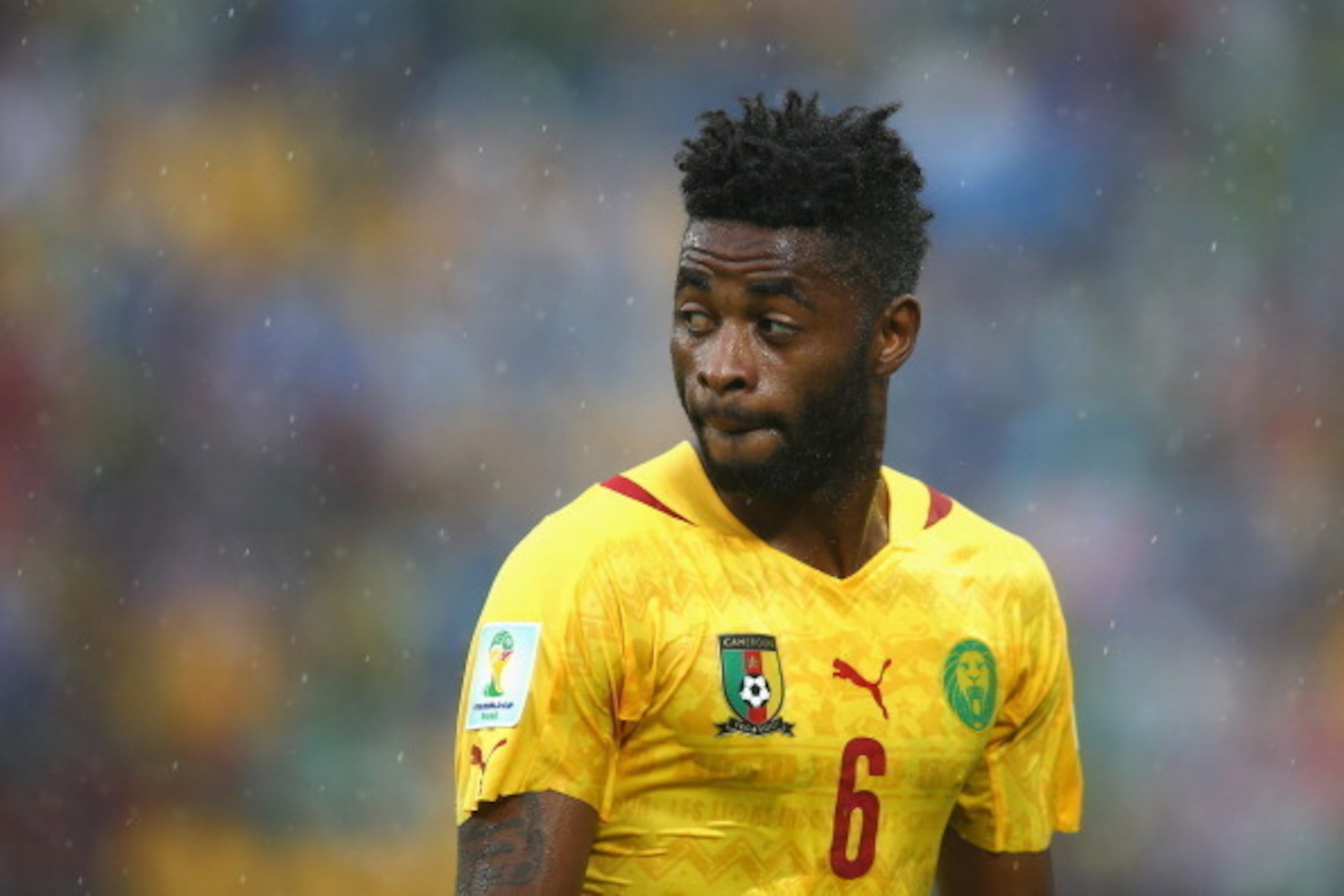 NATAL, BRAZIL - JUNE 13: Alex Song of Cameroon looks on during the 2014 FIFA World Cup Brazil Group A match between Mexico and Cameroon at Estadio das Dunas on June 13, 2014 in Natal, Brazil. (Photo by Julian Finney/Getty Images) NATAL, BRAZIL - JUNE 13: Alex Song of Cameroon looks on during the 2014 FIFA World Cup Brazil Group A match between Mexico and Cameroon at Estadio das Dunas on June 13, 2014 in Natal, Brazil. (Photo by Julian Finney/Getty Images)