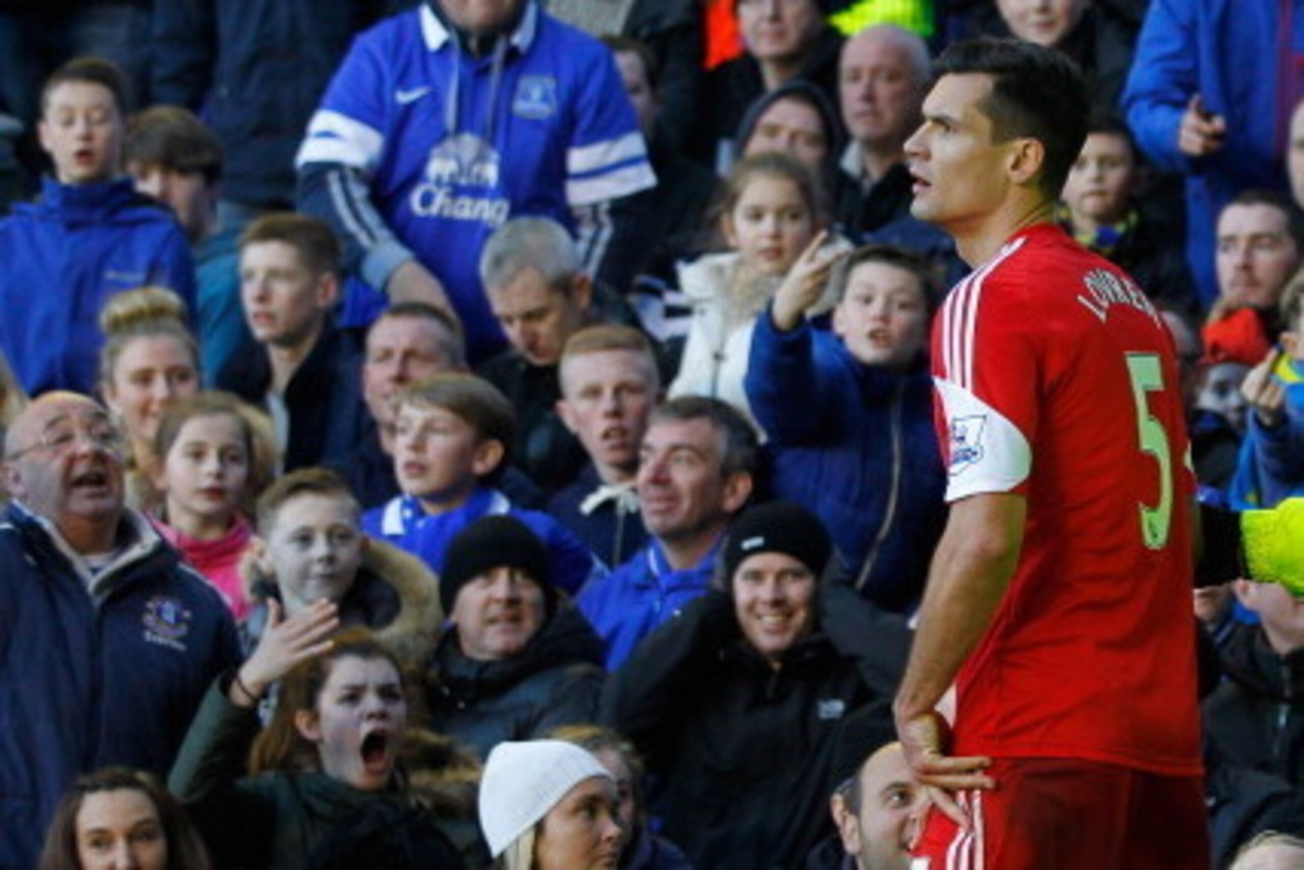 LIVERPOOL, ENGLAND - DECEMBER 29:   Everton fans react to Dejan Lovren of Southampton after he asked for his team-mate Gaston Ramirez's shirt back during the Barclays Premier League match between Everton and Southampton at Goodison Park on December 29, 20