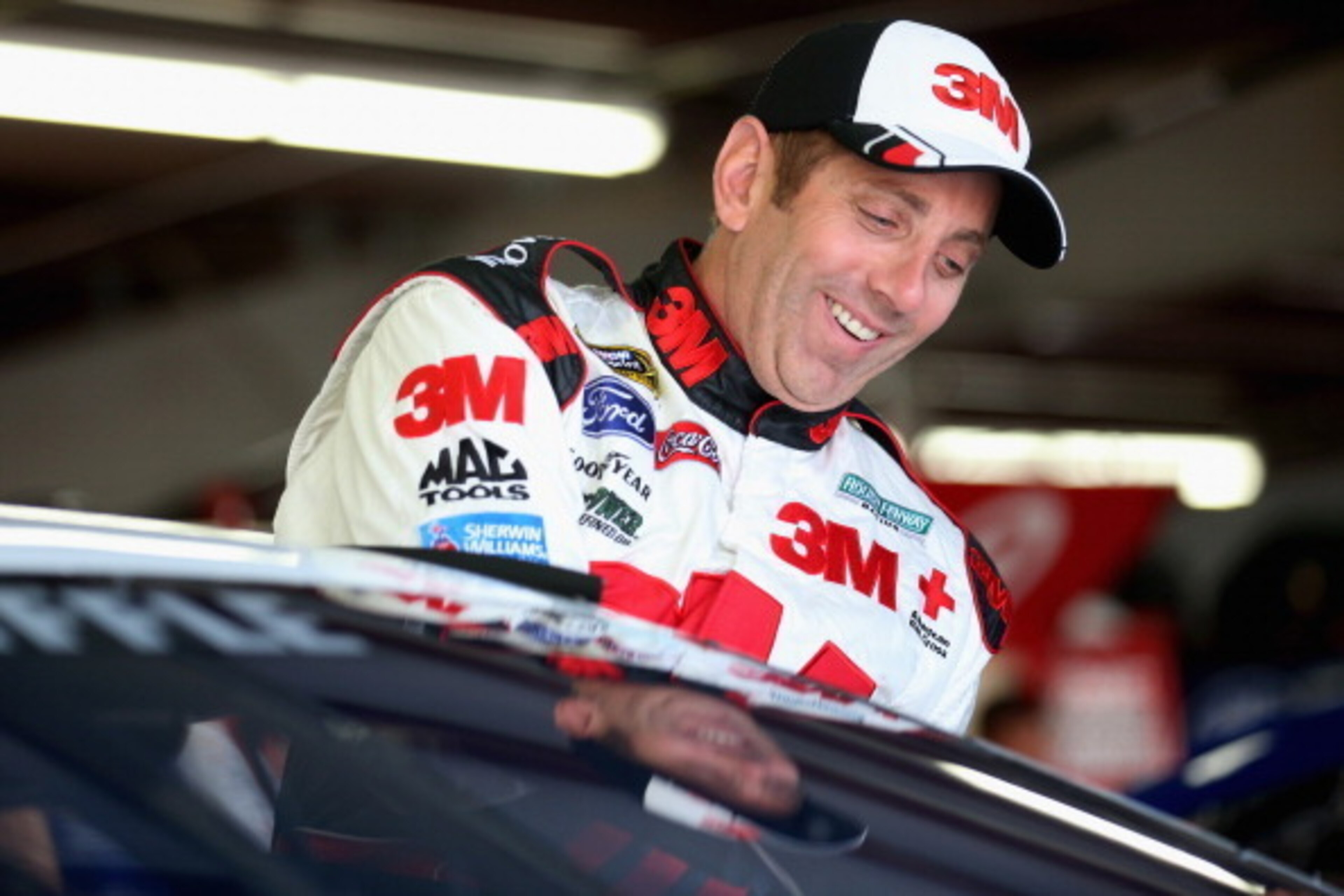 LOUDON, NH - JULY 12: Greg Biffle, driver of the #16 NESN 30th Anniversary Ford, prepares to practice for the NASCAR Sprint Cup Series Camping World RV Sales 301 at New Hampshire Motor Speedway on July 12, 2014 in Loudon, New Hampshire. (Photo by Nick L LOUDON, NH - JULY 12: Greg Biffle, driver of the #16 NESN 30th Anniversary Ford, prepares to practice for the NASCAR Sprint Cup Series Camping World RV Sales 301 at New Hampshire Motor Speedway on July 12, 2014 in Loudon, New Hampshire. (Photo by Nick L