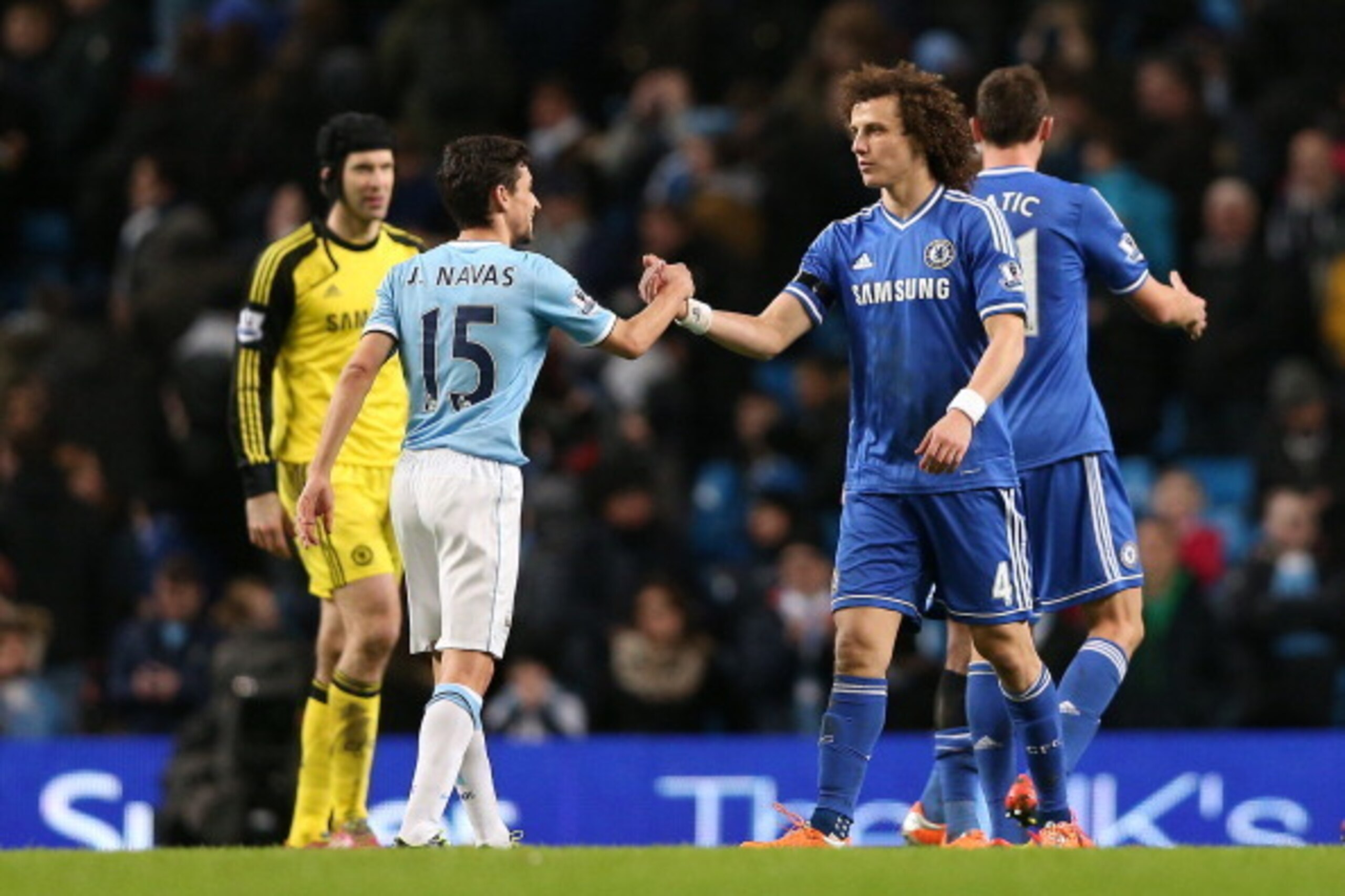 MANCHESTER, ENGLAND - FEBRUARY 15: David Luiz of Chelsea shakes hands at the end of the match with Jesus Navas of Manchester City after the FA Cup Fifth Round match sponsored by Budweiser between Manchester City and Chelsea at Etihad Stadium on February 1