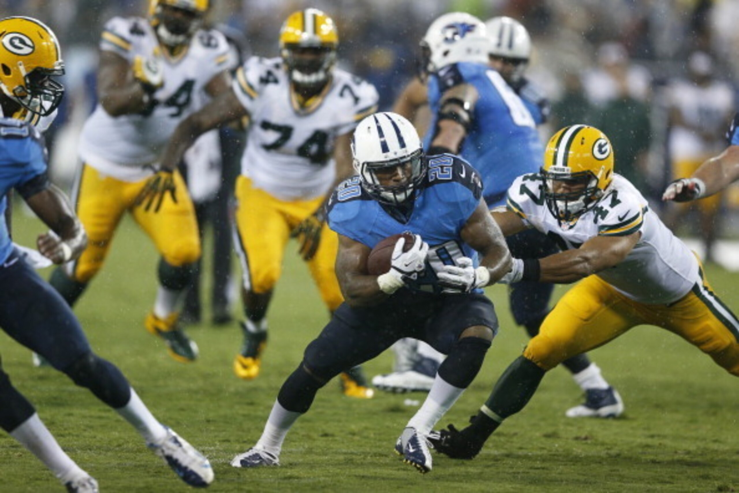 NASHVILLE, TN - AUGUST 09: Bishop Sankey #20 of the Tennessee Titans runs with the ball in the second half of an NFL preseason game against the Green Bay Packers at LP Field on August 9, 2014 in Nashville, Tennessee. The Titans won 20-16. (Photo by Joe Ro NASHVILLE, TN - AUGUST 09: Bishop Sankey #20 of the Tennessee Titans runs with the ball in the second half of an NFL preseason game against the Green Bay Packers at LP Field on August 9, 2014 in Nashville, Tennessee. The Titans won 20-16. (Photo by Joe Ro