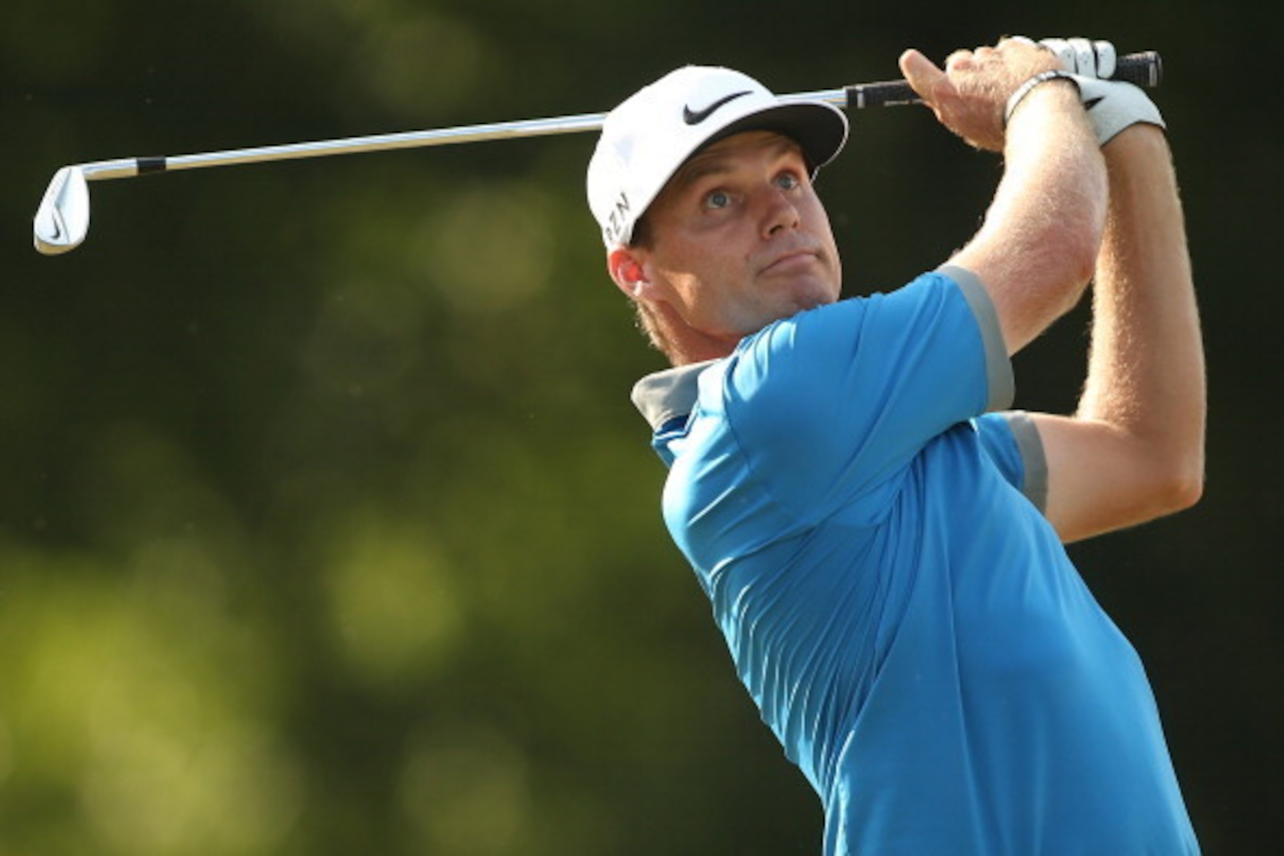 GREENSBORO, NC - AUGUST 16:  Nick Watney plays his tee shot on the 16th hole during the third round of the Wyndham Championship at Sedgefield Country Club on August 16, 2014 in Greensboro, North Carolina.  (Photo by Darren Carroll/Getty Images)