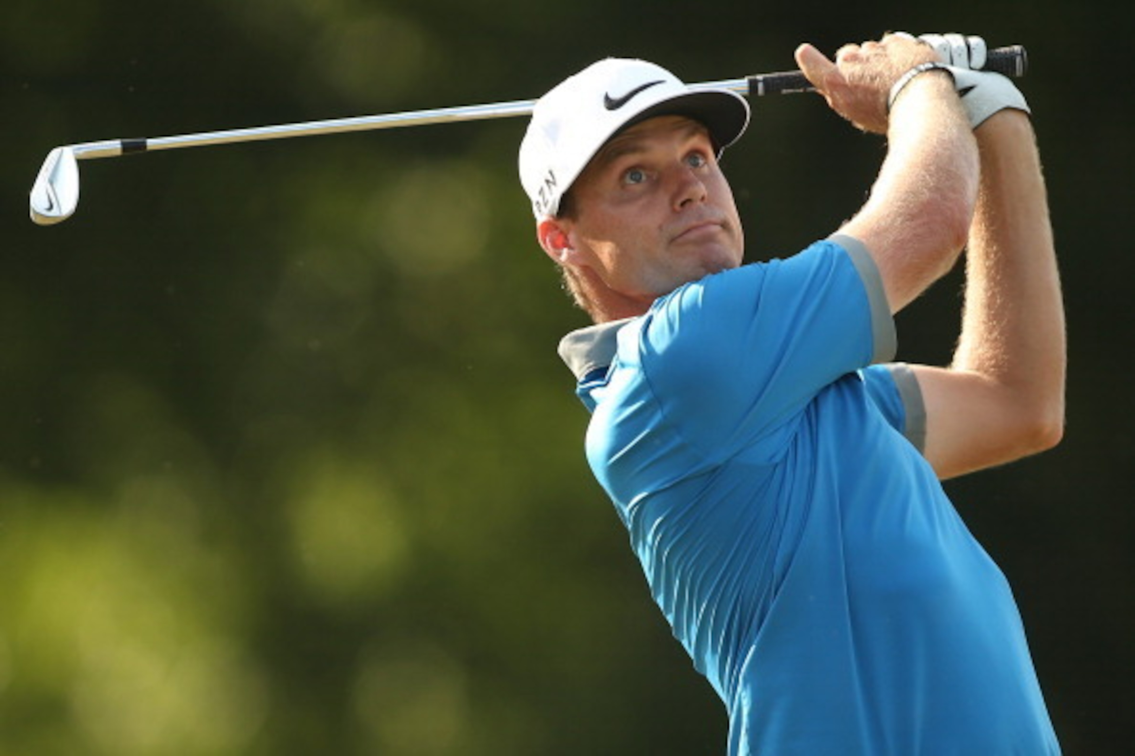 GREENSBORO, NC - AUGUST 16:  Nick Watney plays his tee shot on the 16th hole during the third round of the Wyndham Championship at Sedgefield Country Club on August 16, 2014 in Greensboro, North Carolina.  (Photo by Darren Carroll/Getty Images)