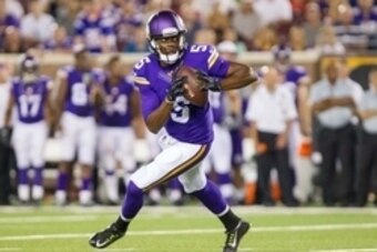 Aug 16, 2014; Minneapolis, MN, USA; Minnesota Vikings quarterback Teddy Bridgewater (5) runs out of the pocket in the fourth quarter against the Arizona Cardinals at TCF Bank Stadium. The Vikings won 30-28. Mandatory Credit: Brad Rempel-USA TODAY Sports