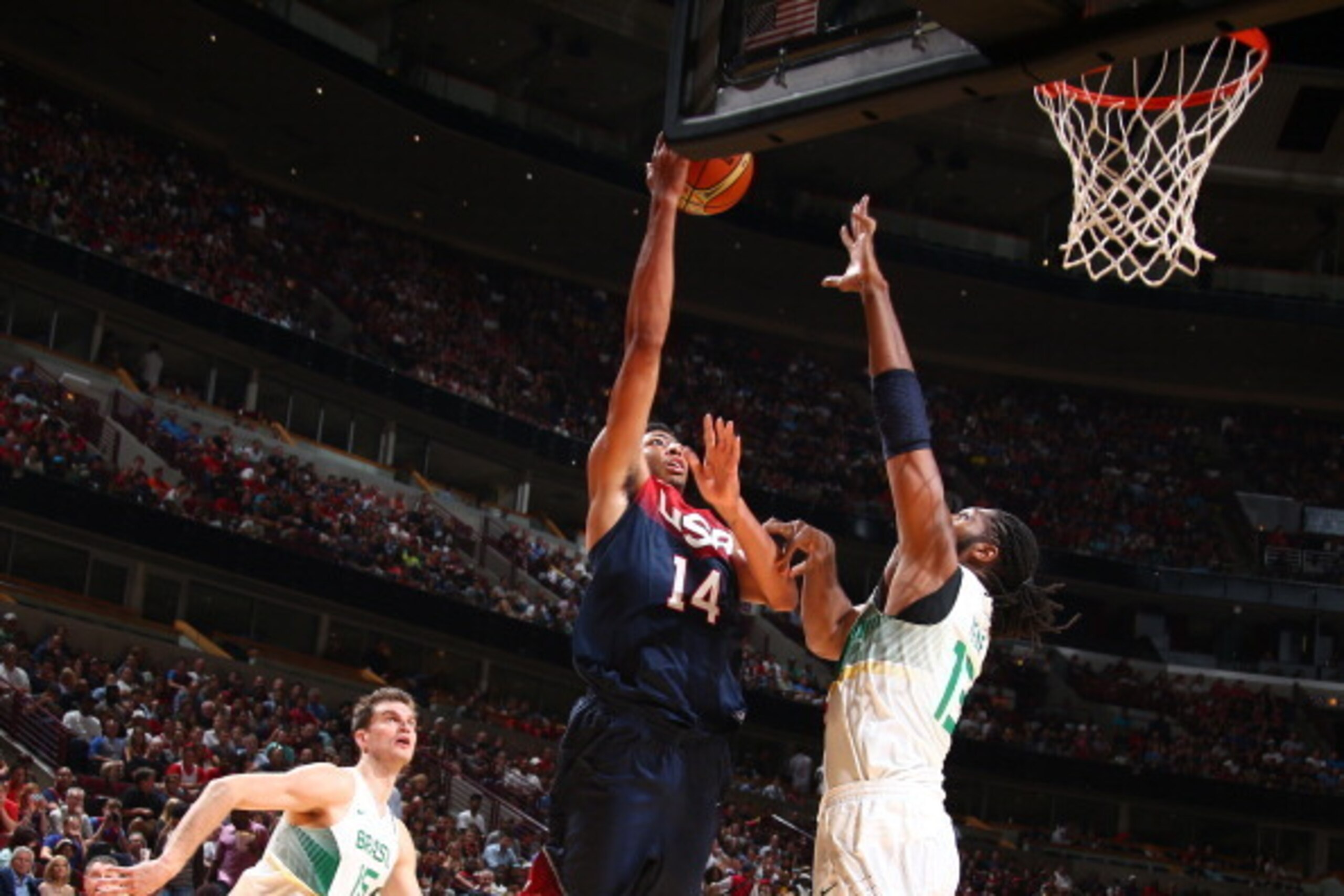 CHICAGO, IL - AUGUST 16: Anthony Davis #14 of the USA Basketball Men's National Team goes up to shoot against Nene #13 of the Brazil Basketball Men's National Team on August 16, 2014 at the United Center in Chicago, Illinois.  NOTE TO USER: User expressly