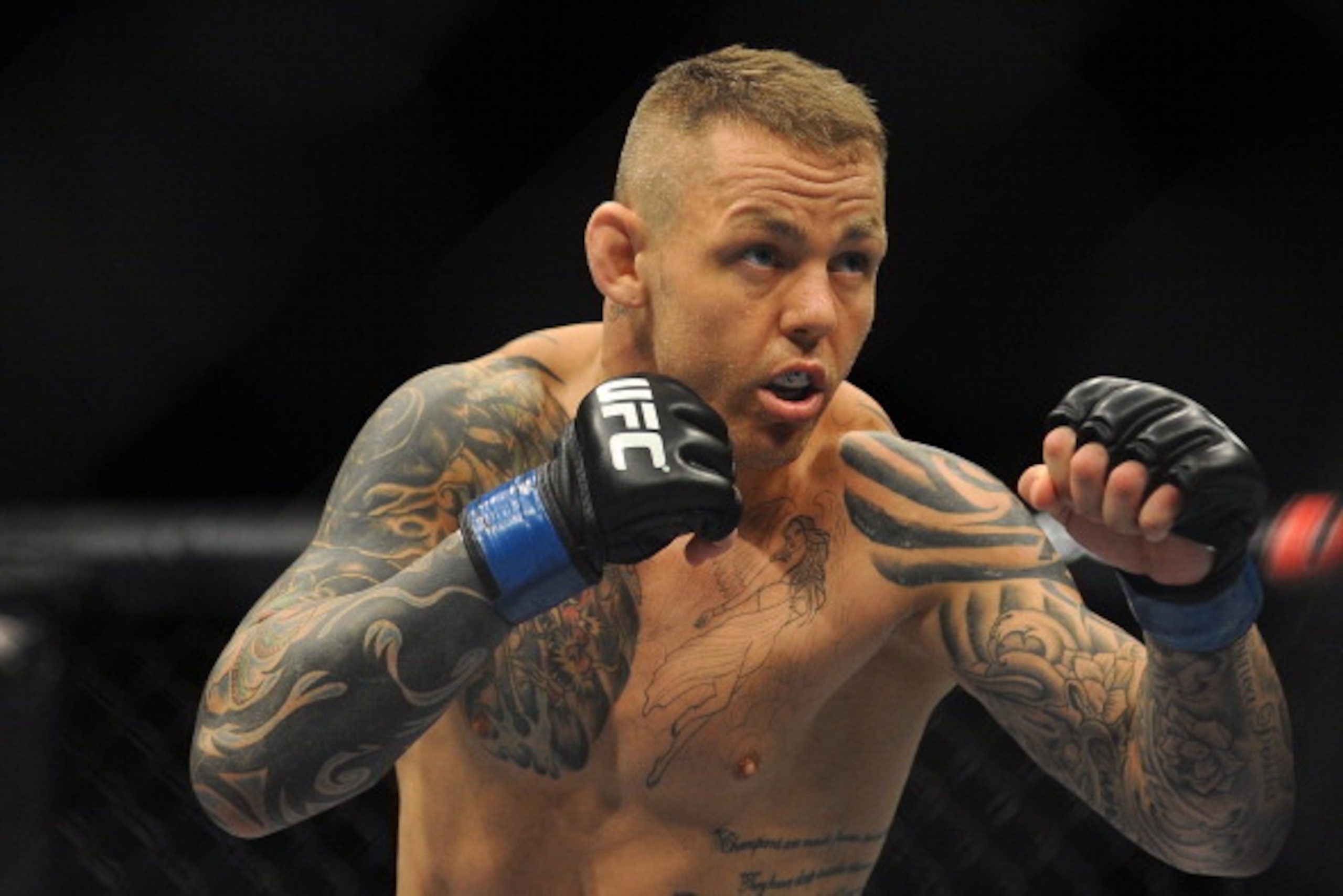 GOLD COAST, AUSTRALIA - DECEMBER 15:  Ross Pearson stands in the octagon during the Lightweight bout between George Sotiropoulos and Ross Pearson at Gold Coast Convention and Exhibition Centre on December 15, 2012 on the Gold Coast, Australia.  (Photo by 