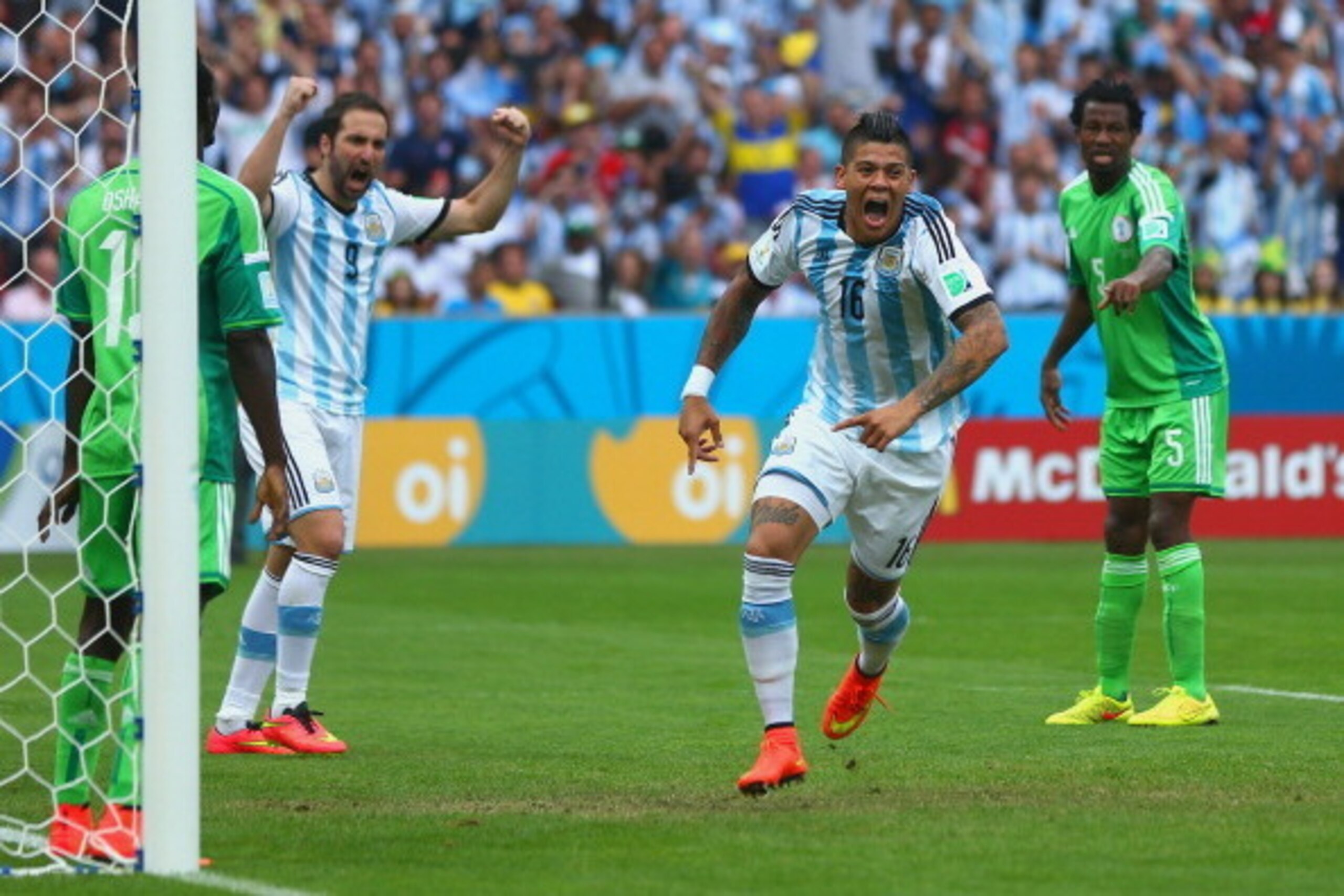 PORTO ALEGRE, BRAZIL - JUNE 25:  Marcos Rojo of Argentina celebrates scoring his team's third goal during the 2014 FIFA World Cup Brazil Group F match between Nigeria and Argentina at Estadio Beira-Rio on June 25, 2014 in Porto Alegre, Brazil.  (Photo by 