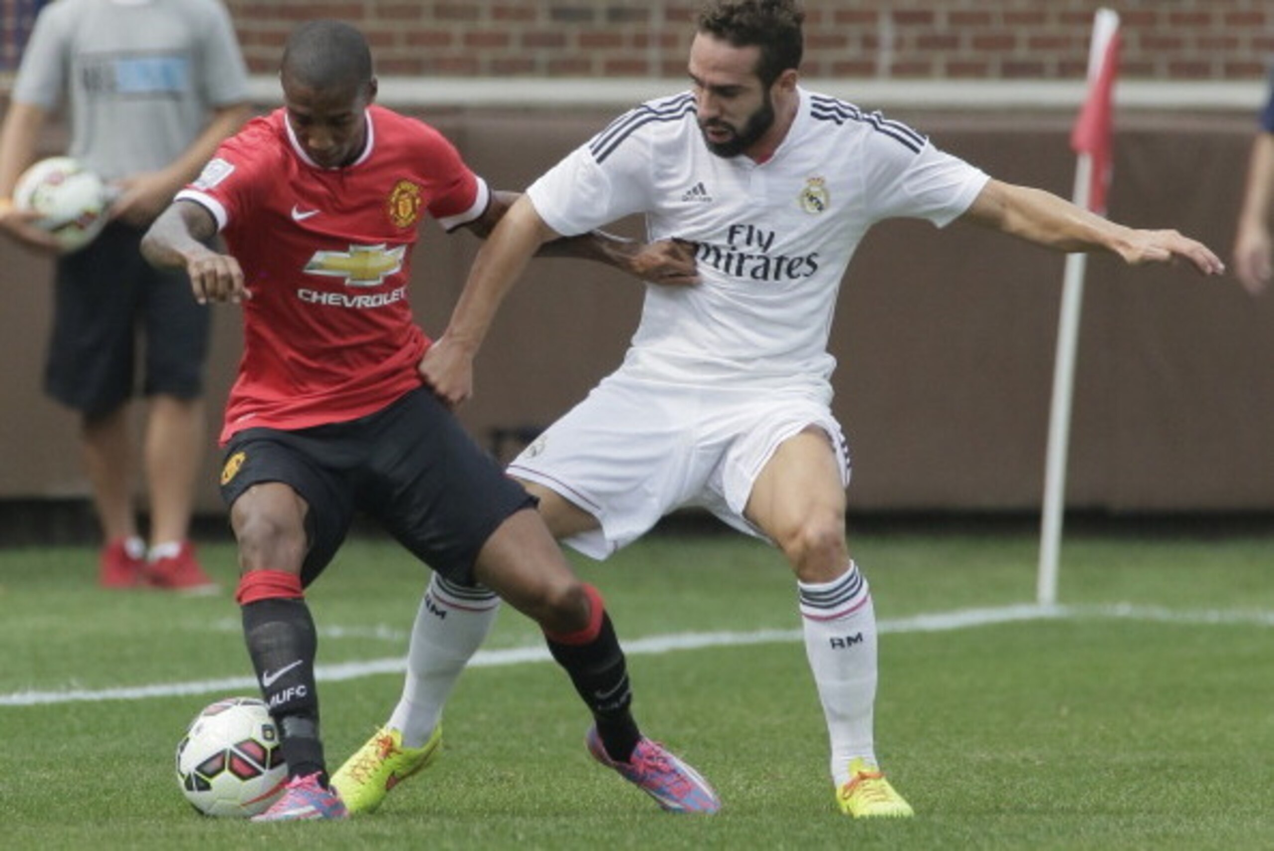 ANN ARBOR, MI - AUGUST 2: Dani Carvajal #15 of Real Madrid tries to steal the ball from Ashley Young #18 of Manchester United during the first half of the Guinness International Champions Cup at Michigan Stadium on August 2, 2014, in Ann Arbor, Mich (Phot